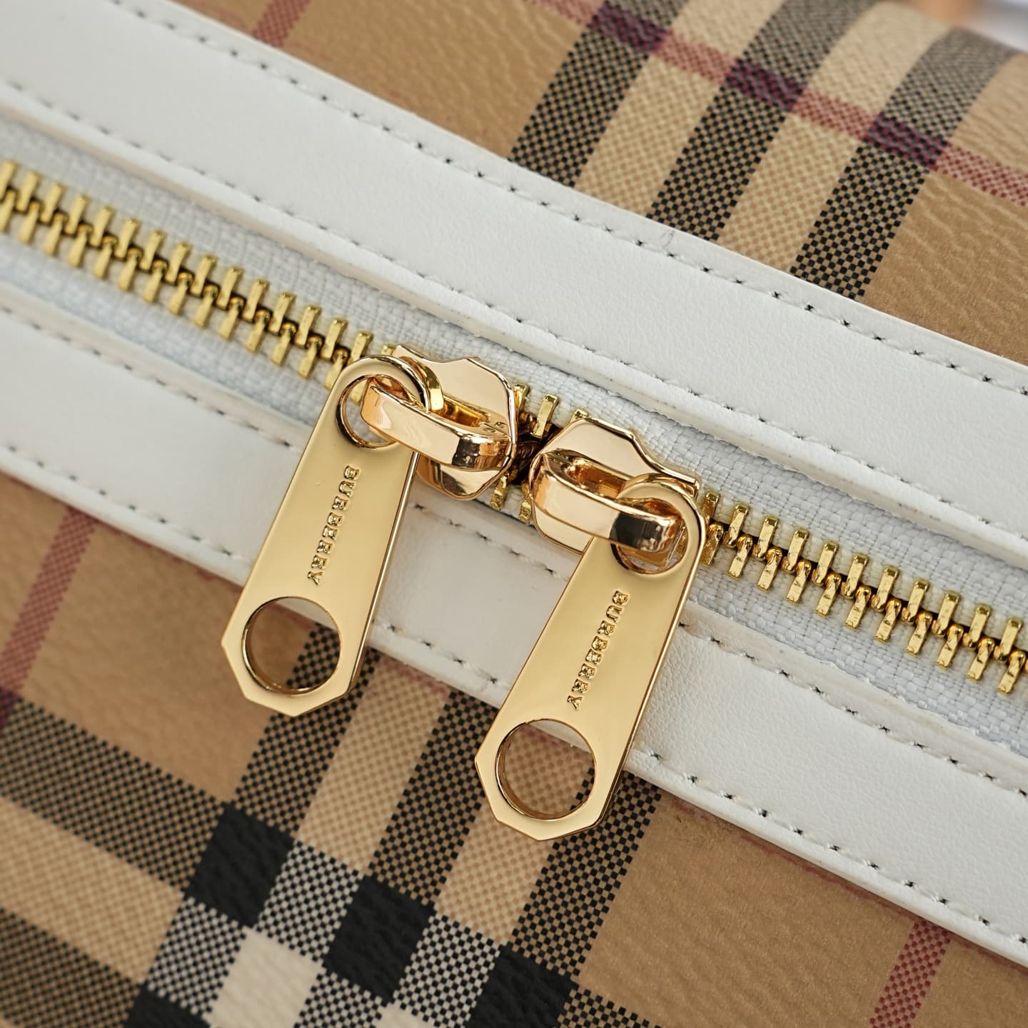 C93 The B family pattern Vanity bag is made from cotton-blend fabric and crafted by artisans in Italy. It features a Burberry pattern print in the iconic classic beige color, along with leather trim with visible ribbing. The bag has a stylish shape, inspi — image 5