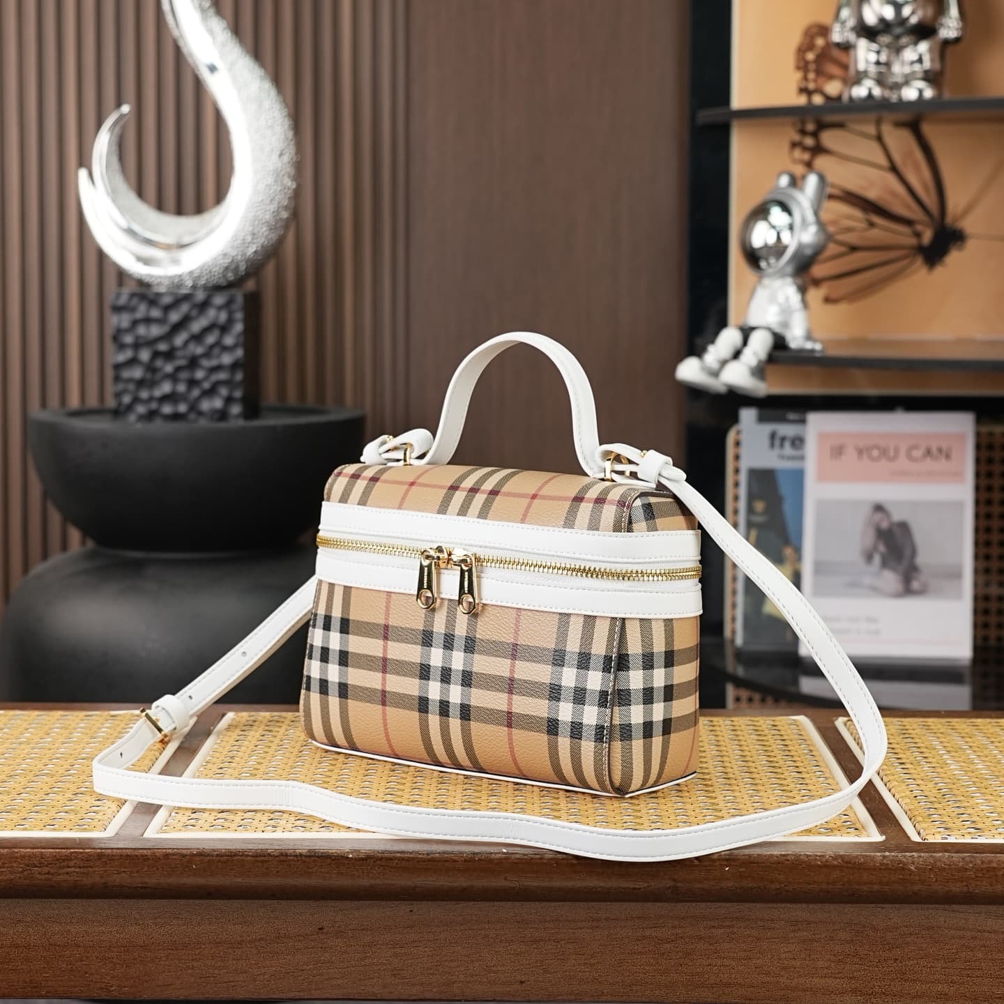 C93 The B family pattern Vanity bag is made from cotton-blend fabric and crafted by artisans in Italy. It features a Burberry pattern print in the iconic classic beige color, along with leather trim with visible ribbing. The bag has a stylish shape, inspi — image 3