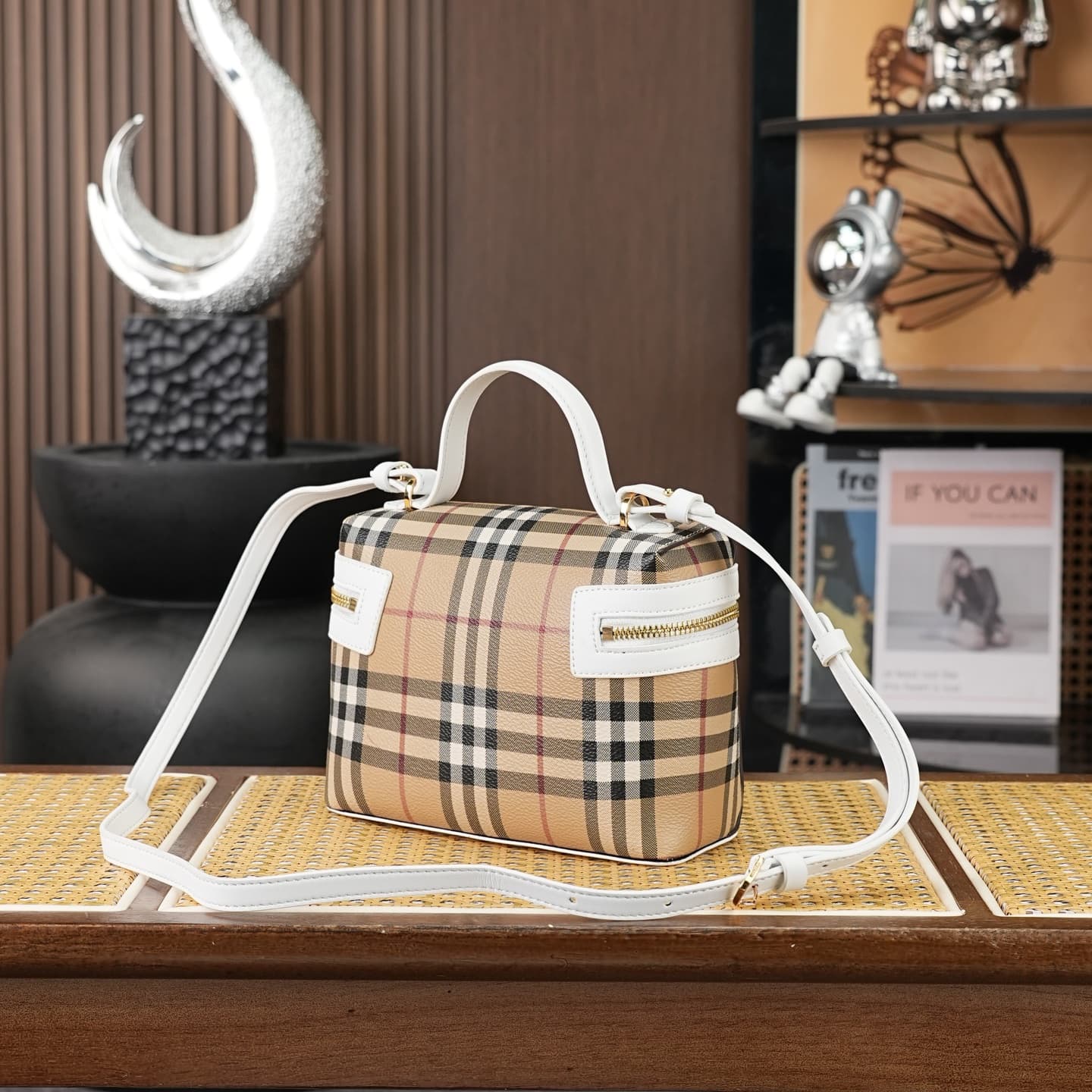 C93 The B family pattern Vanity bag is made from cotton-blend fabric and crafted by artisans in Italy. It features a Burberry pattern print in the iconic classic beige color, along with leather trim with visible ribbing. The bag has a stylish shape, inspi — image 2