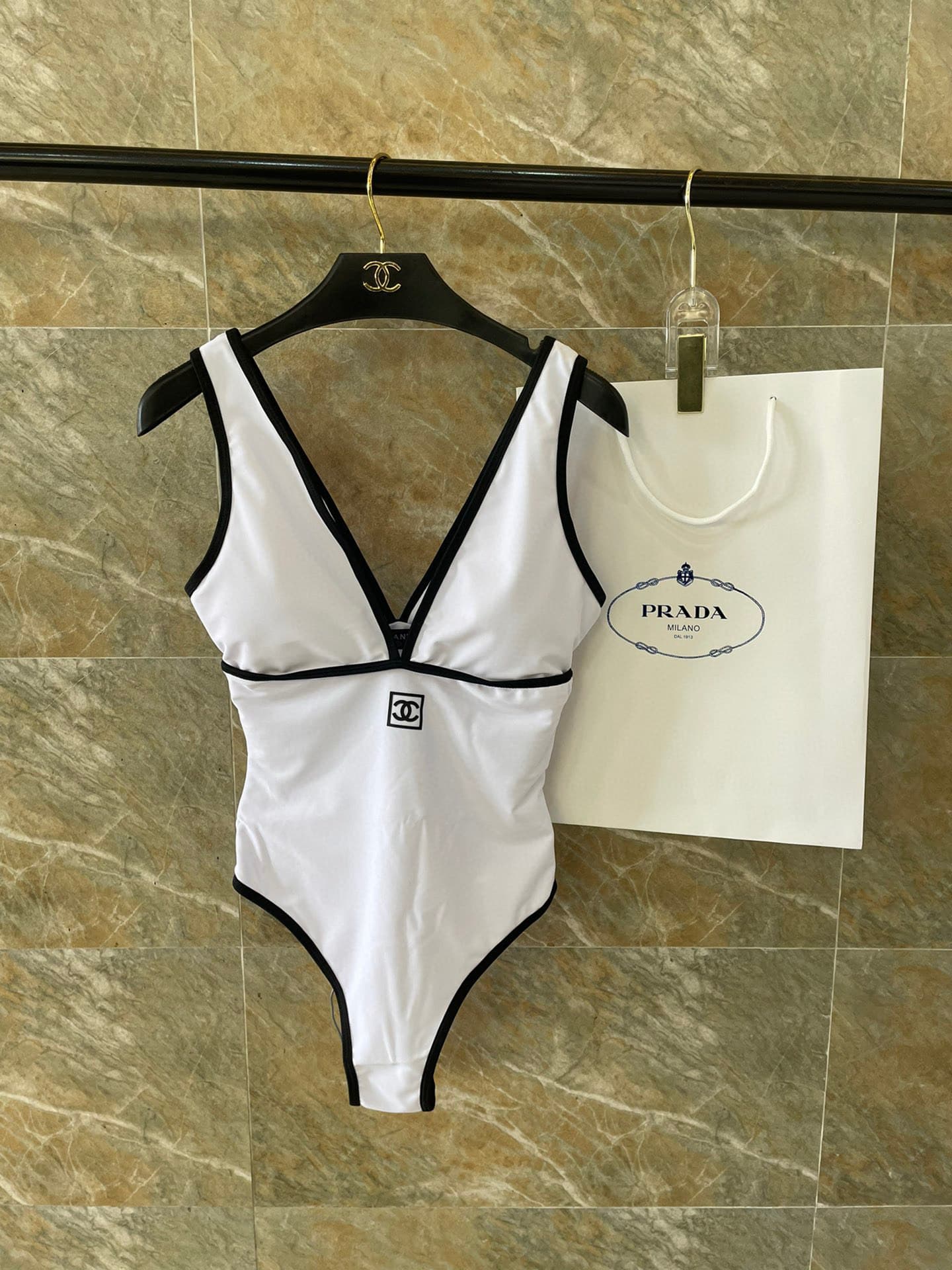 C24899 Chanel swimsuit – Chanel’s new backless one-piece swimsuit in black, simple and elegant. It’s suitable for various swimming scenarios 🏊‍♀️ Whether at the beach, in a swimming pool, in hot springs, or at water parks – it works well 😌 It can also be  — image 2