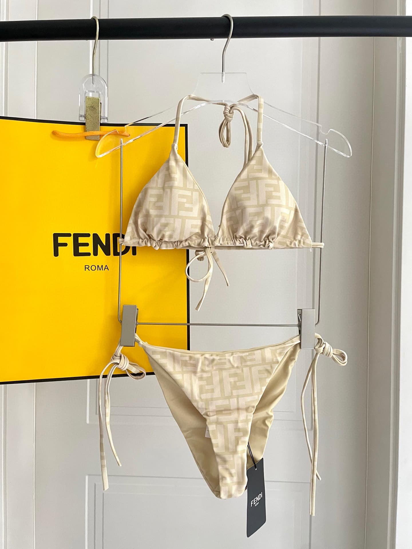 C24878 Fendi swimsuits. Fendi-printed bikini swimsuits – excellent for the upper body! Released simultaneously at various stores, giving a stylish look naturally. They effectively age-defying, offering a youthful and energetic appearance. SML Xl — image 1