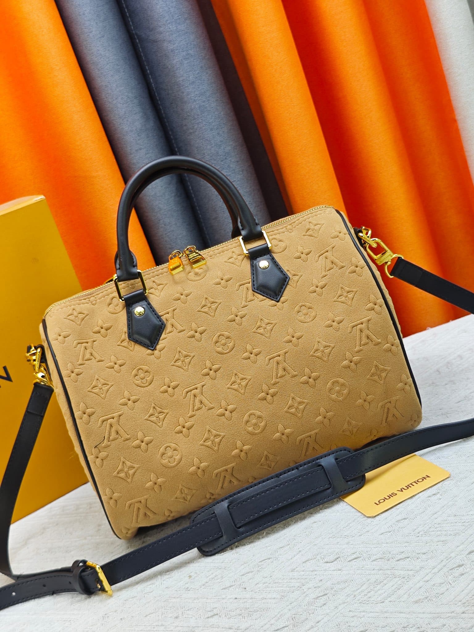 C5036 💰 M13332 M13344 Apricot-colored embossed suede, for shows. This model, Speedy Soft 30, is from LV Travels With Grace Coddlington. — image 4