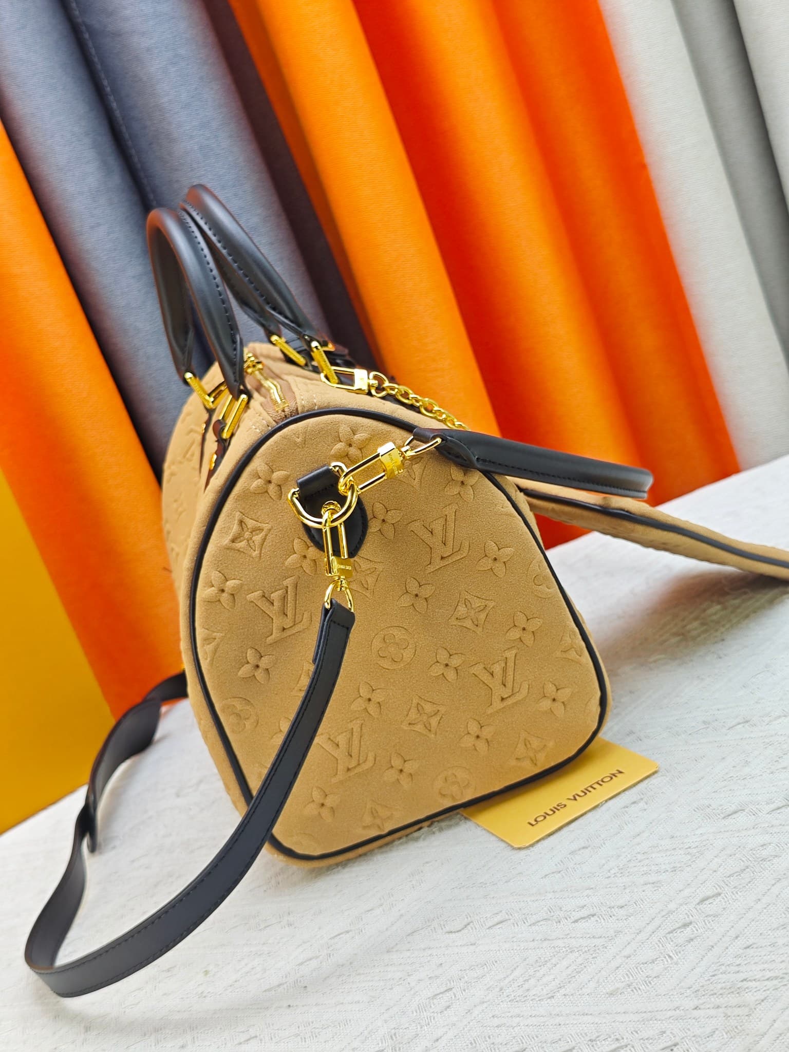 C5036 💰 M13332 M13344 Apricot-colored embossed suede, for shows. This model, Speedy Soft 30, is from LV Travels With Grace Coddlington. — image 3