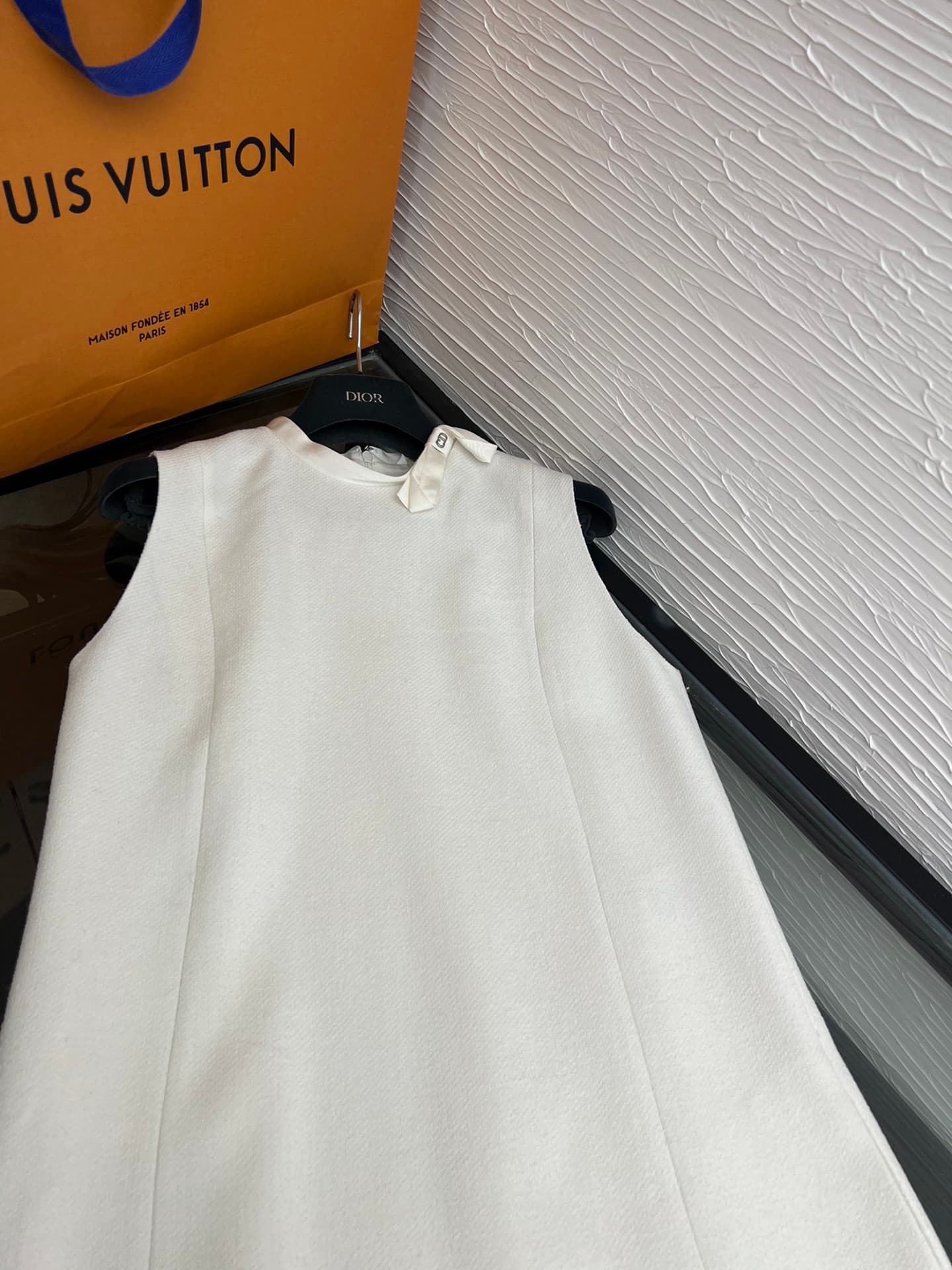 C18391 Image of the white dress laid flat — image 2
