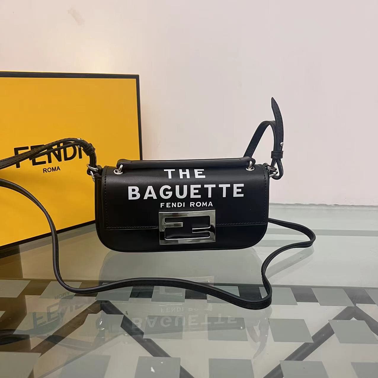 C2959 “BAGUETTE” generally refers to “baguette bread”. In the fashion industry, it is also the name of a classic handbag brand from FENDI, known as the “FENDI Baguette Bag”. “FENDI” is a well-known Italian fashion brand that is famous for its high-end lea — image 1