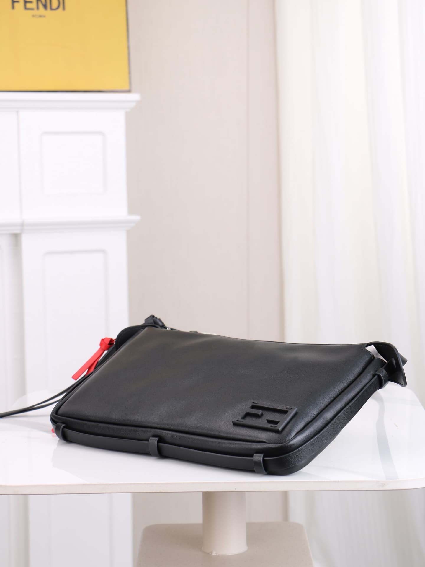 C2873 The medium-sized 4409 Simply FENDI handbag is a soft crossbody bag that appeared at the autumn and winter fashion shows. It draws its inspiration from the classic design of 20 and 90 from the early years of that era; it was named after its elegant,  — image 4