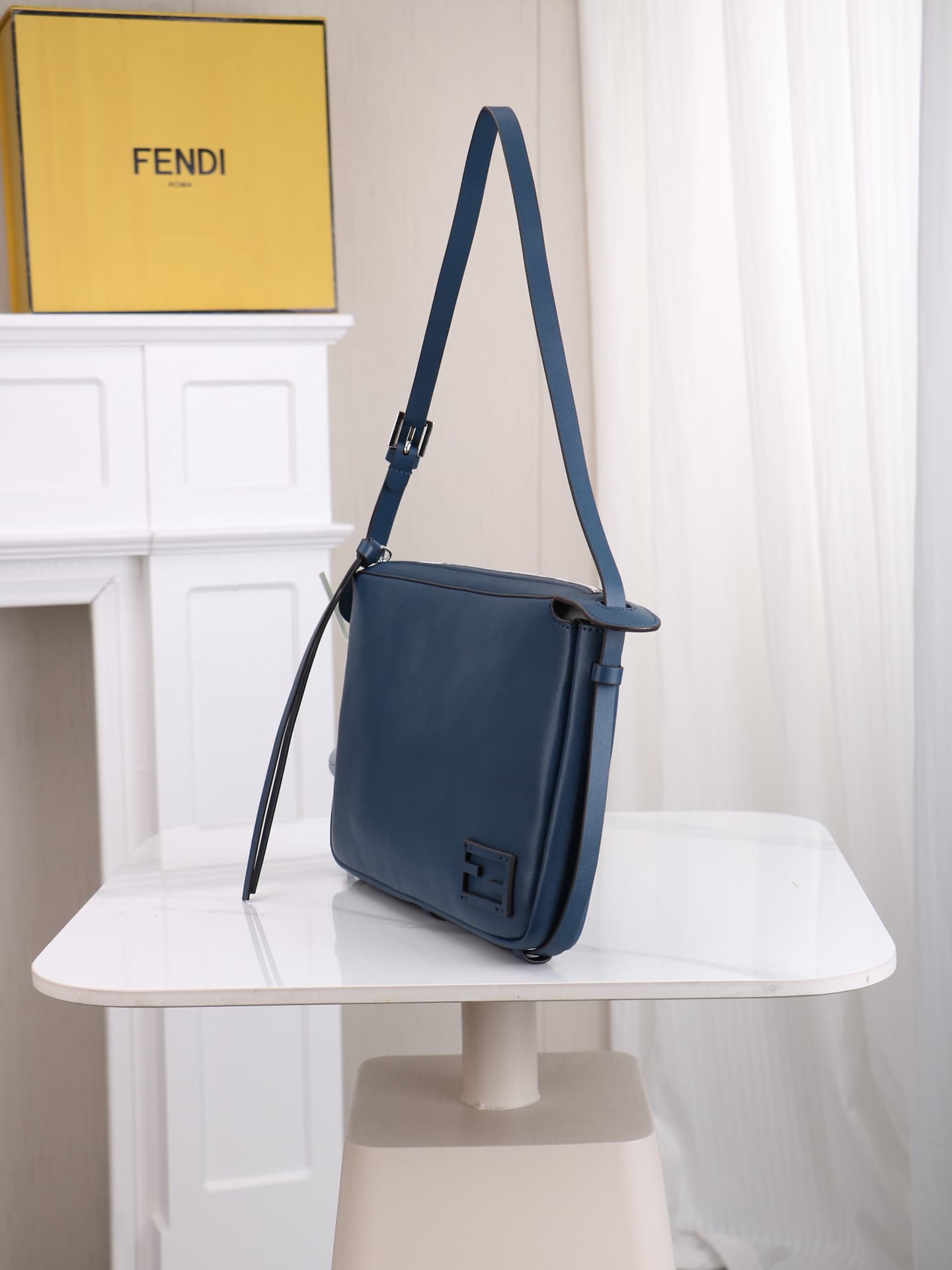 C2872 The medium-sized 4409 Simply FENDI handbag is a soft crossbody bag that was showcased at the autumn and winter fashion shows. It draws its inspiration from the classic design styles of 20 and 90 from the early years of that era; thus, it was named a — image 3