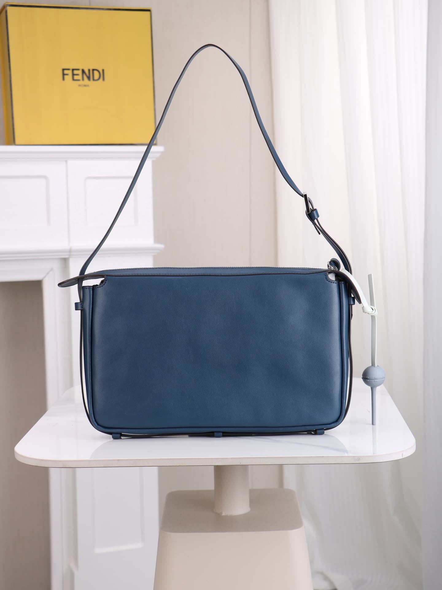 C2872 The medium-sized 4409 Simply FENDI handbag is a soft crossbody bag that was showcased at the autumn and winter fashion shows. It draws its inspiration from the classic design styles of 20 and 90 from the early years of that era; thus, it was named a — image 2