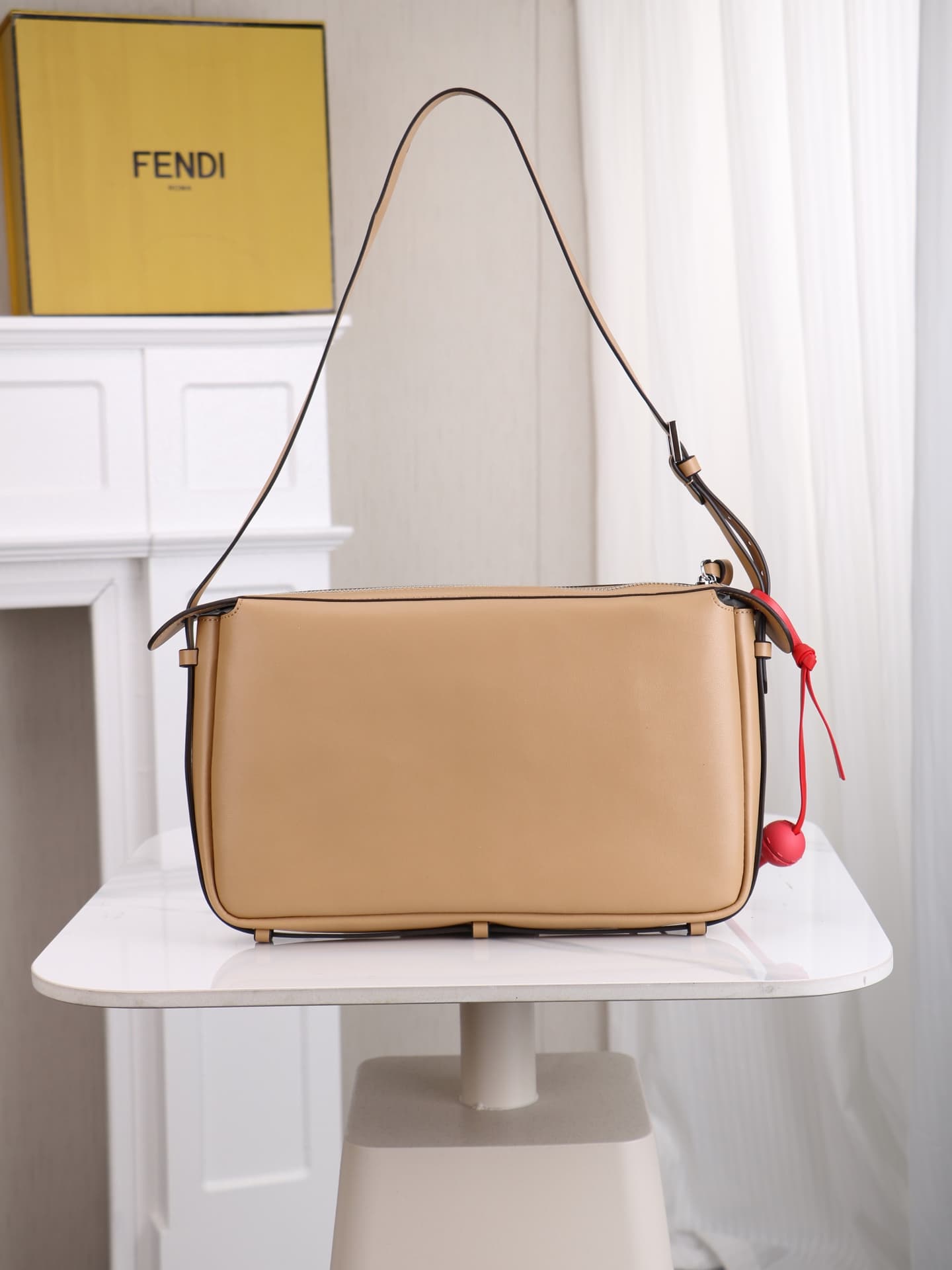 C2871 The medium-sized 4409 Simply FENDI handbag is a soft crossbody bag that appeared at the autumn and winter fashion shows. It draws its inspiration from the classic design of 20 and 90 from the early years of that era; it was named after its elegant,  — image 2