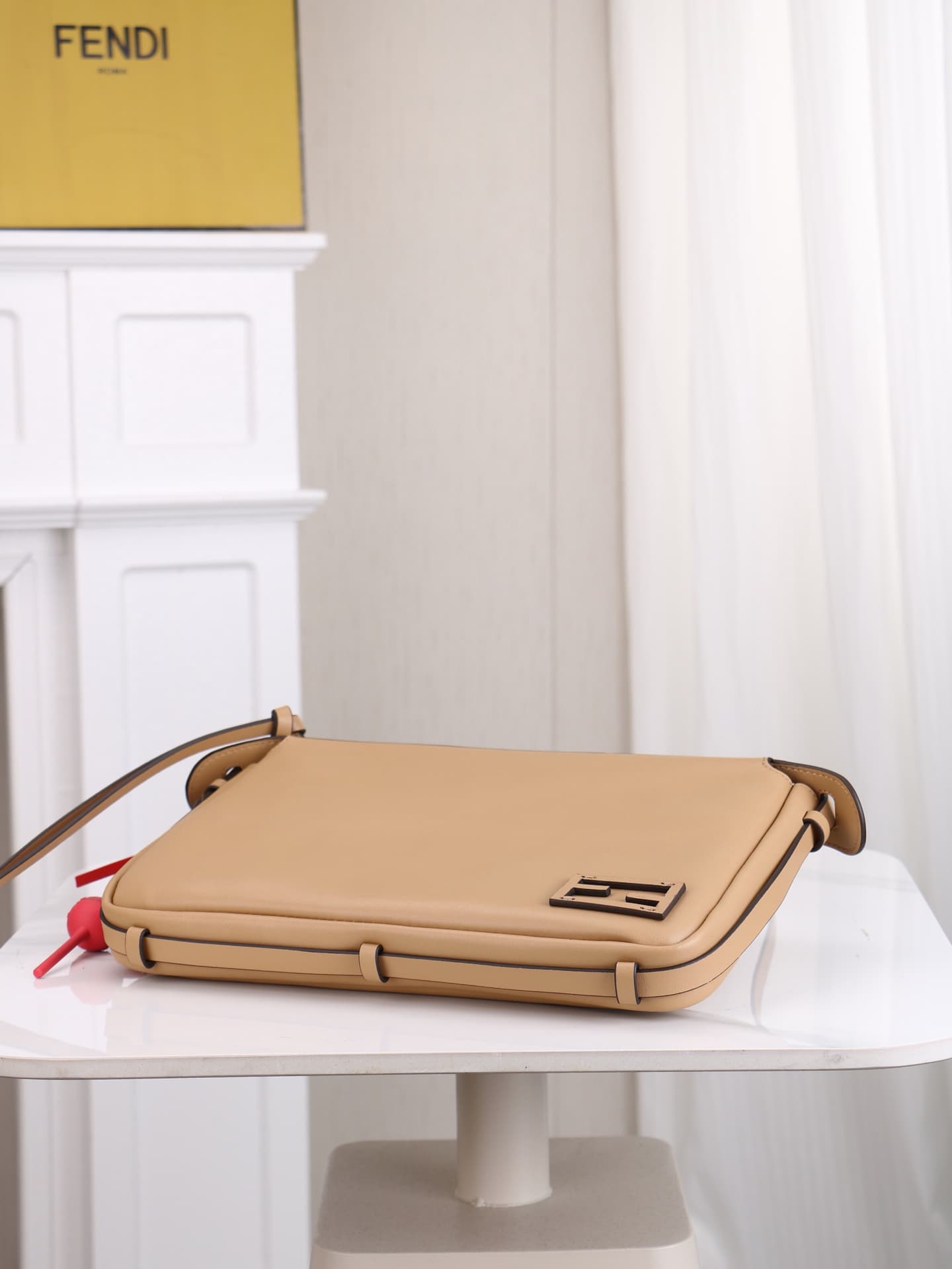 C2871 The medium-sized 4409 Simply FENDI handbag is a soft crossbody bag that appeared at the autumn and winter fashion shows. It draws its inspiration from the classic design of 20 and 90 from the early years of that era; it was named after its elegant,  — image 3