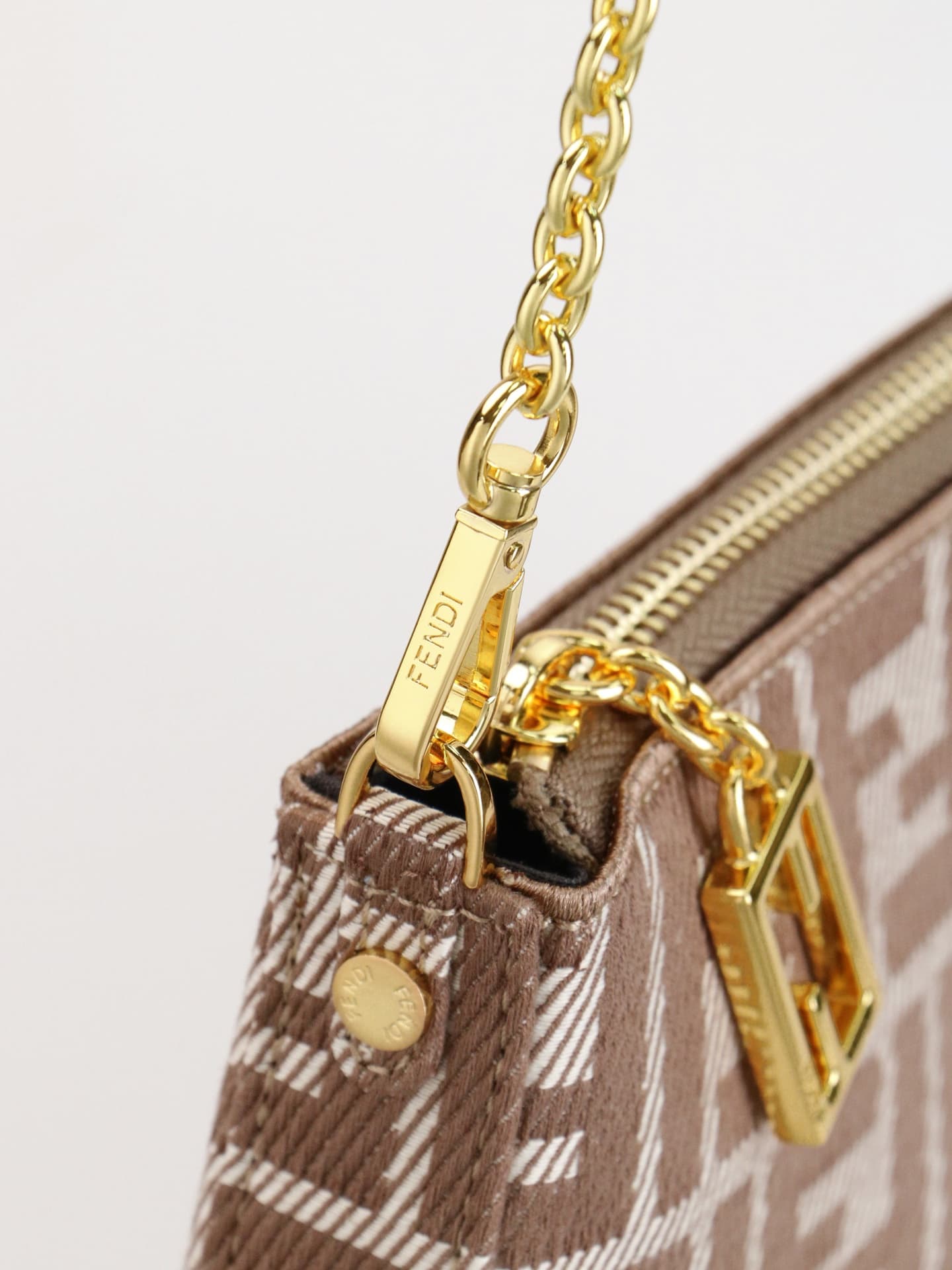 C2861 Model 7717 Baguette handbag. Made of denim print material, with classic double F logos. Features a detachable thin chain and long shoulder strap. Closes with zippers; the zipper pulls have the distinctive FF pattern. It’s small and delicate, perfect — image 5