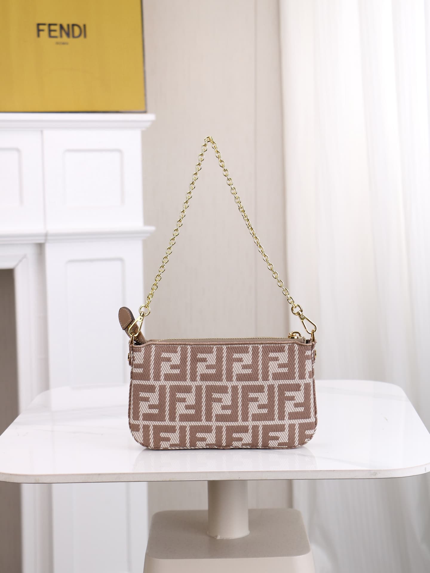 C2861 Model 7717 Baguette handbag. Made of denim print material, with classic double F logos. Features a detachable thin chain and long shoulder strap. Closes with zippers; the zipper pulls have the distinctive FF pattern. It’s small and delicate, perfect — image 3