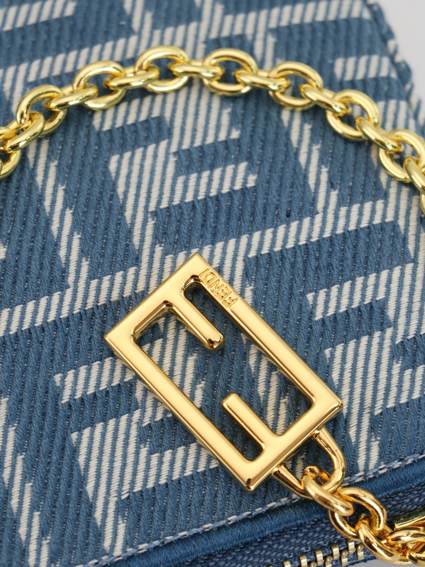 C2863 Model 7717 Baguette handbag. Made of denim print material, with classic double F logos. Features a detachable thin chain and long shoulder strap. Closes with zipper; the zipper pull has the distinctive FF pattern. It’s compact and elegant, perfect f — image 6