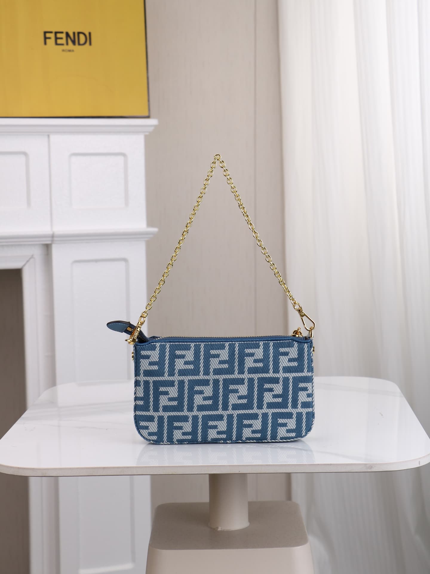 C2863 Model 7717 Baguette handbag. Made of denim print material, with classic double F logos. Features a detachable thin chain and long shoulder strap. Closes with zipper; the zipper pull has the distinctive FF pattern. It’s compact and elegant, perfect f — image 3