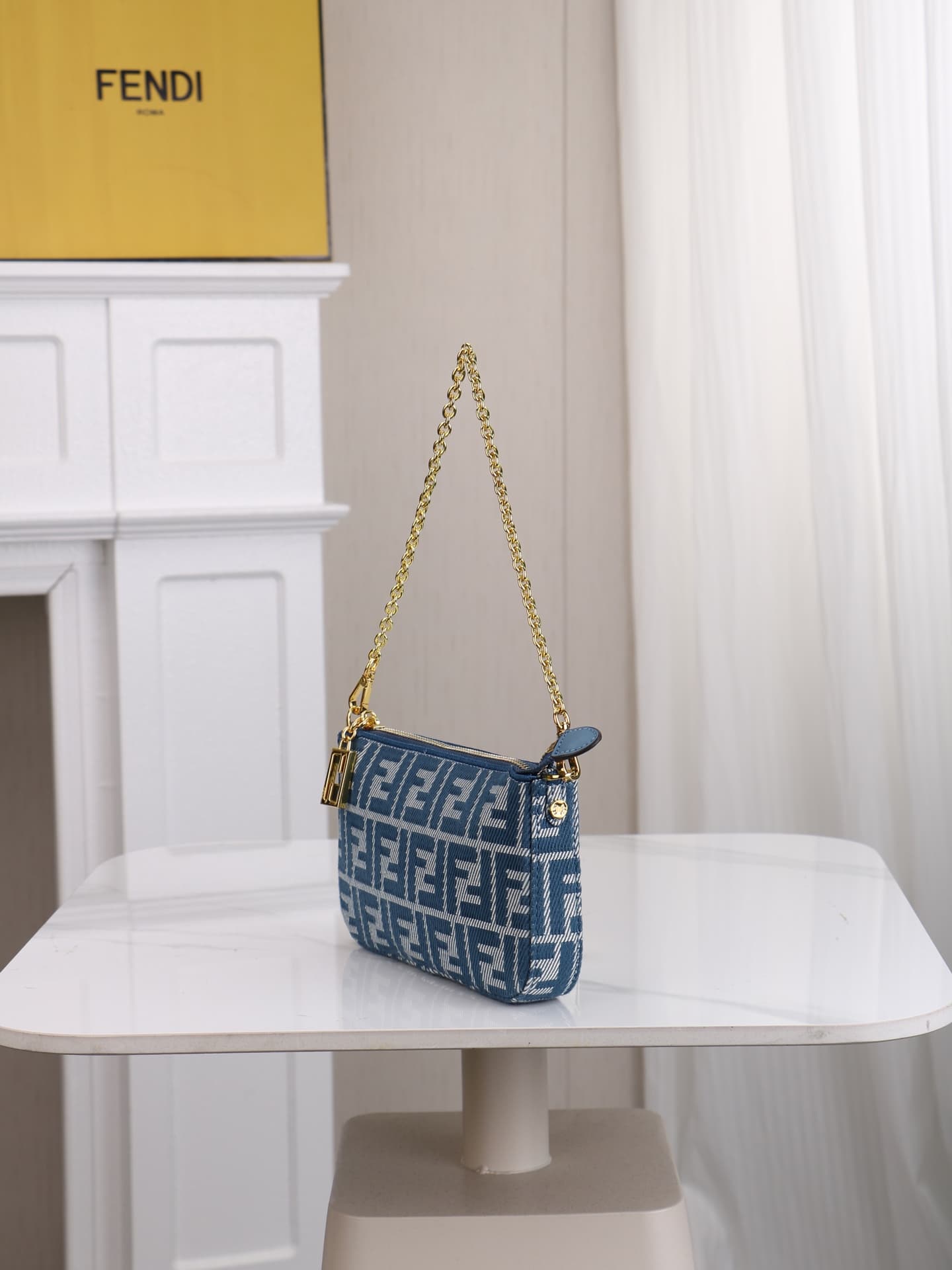 C2863 Model 7717 Baguette handbag. Made of denim print material, with classic double F logos. Features a detachable thin chain and long shoulder strap. Closes with zipper; the zipper pull has the distinctive FF pattern. It’s compact and elegant, perfect f — image 2