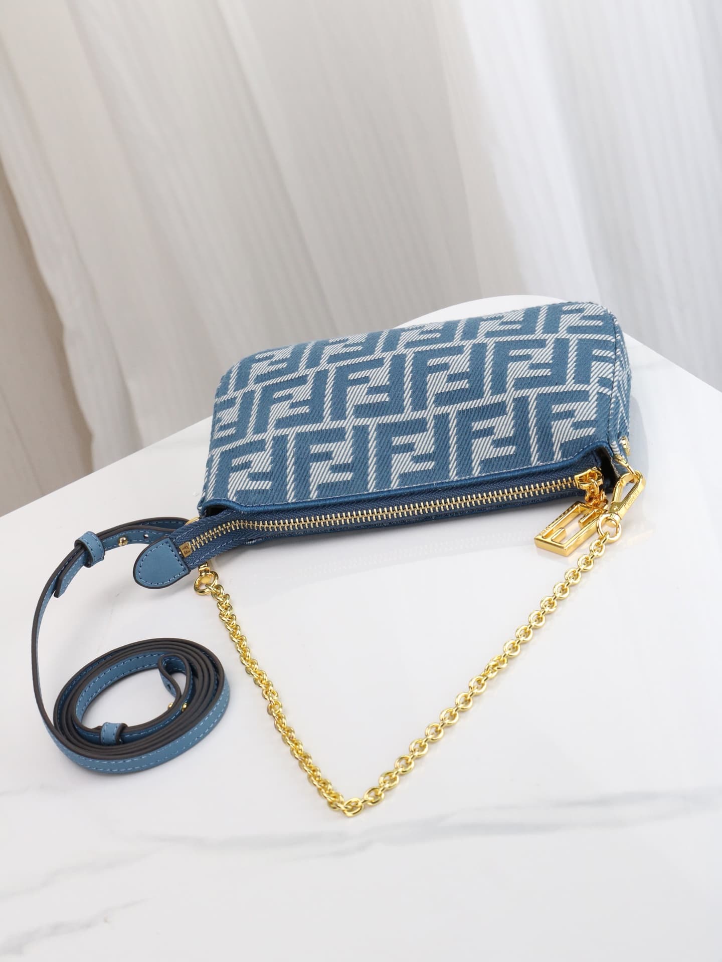 C2863 Model 7717 Baguette handbag. Made of denim print material, with classic double F logos. Features a detachable thin chain and long shoulder strap. Closes with zipper; the zipper pull has the distinctive FF pattern. It’s compact and elegant, perfect f — image 7
