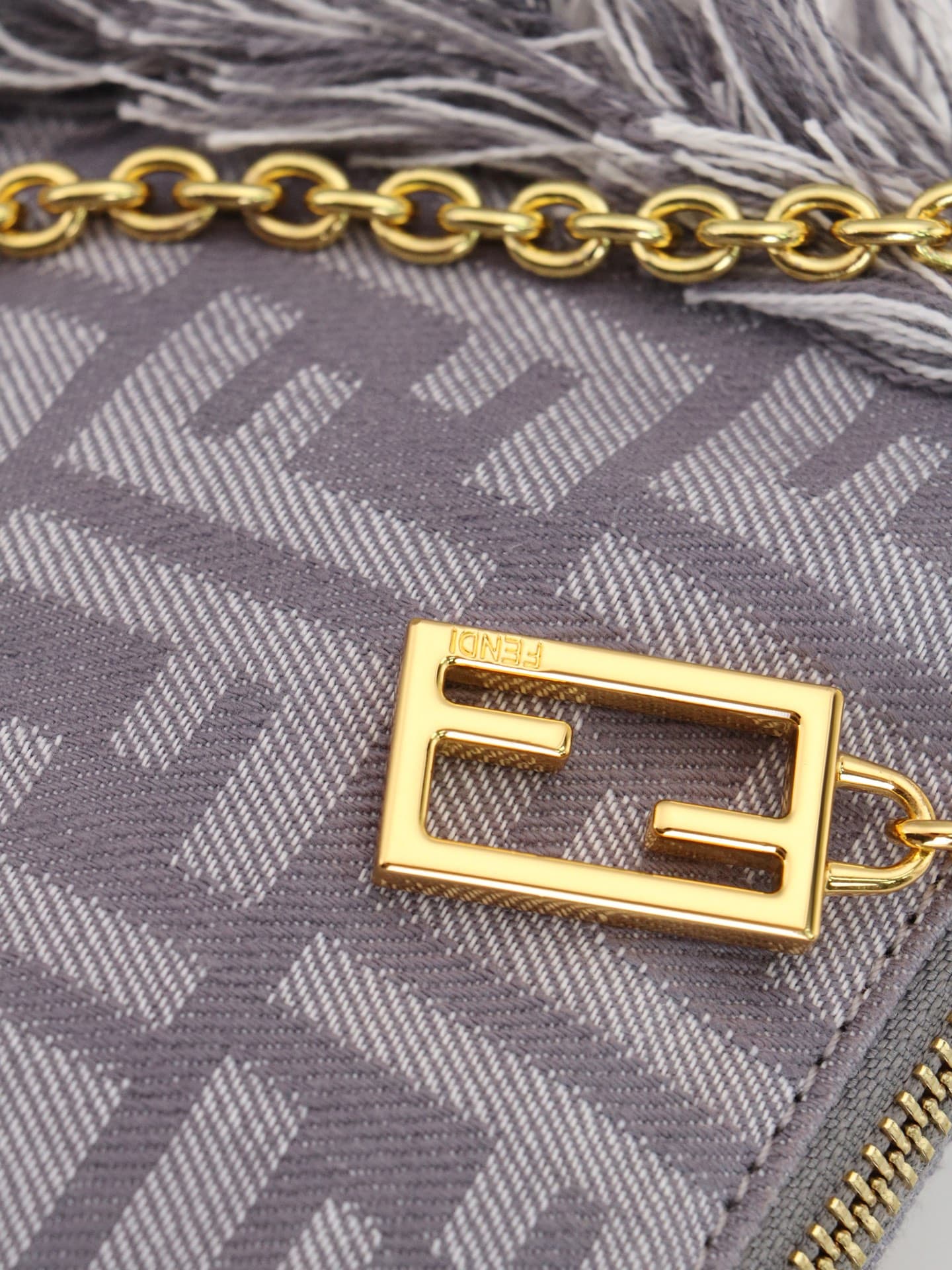 C2860 Model 7717 Baguette handbag. Made of denim print material, with classic double F logos. Features detachable thin chains and long shoulder straps. Closes with zippers, and the zipper pulls have the distinctive FF pattern. It’s compact and elegant; pe — image 5