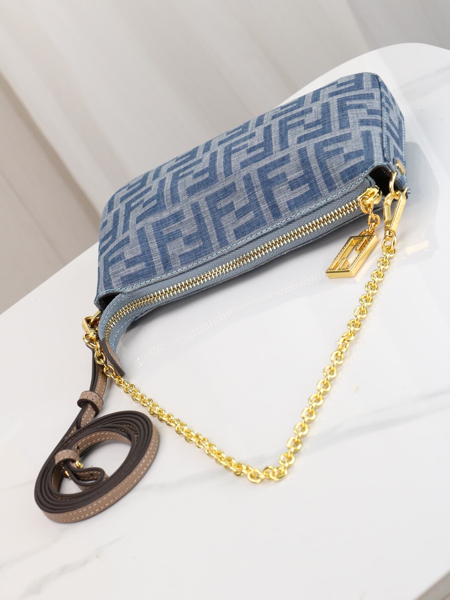 C2859 Model 7717 Baguette handbag. Made of denim print material, with classic double F logos. Features detachable thin chains and long shoulder straps. Opened with zippers, and the zipper pulls have the distinctive FF pattern. It’s compact and elegant; pe — image 8