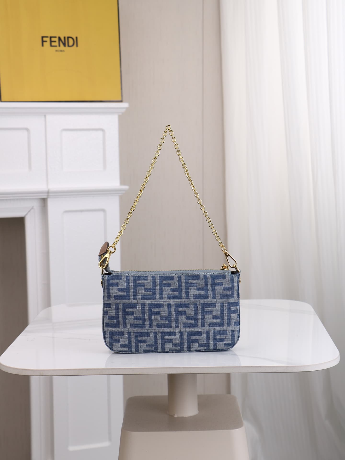 C2859 Model 7717 Baguette handbag. Made of denim print material, with classic double F logos. Features detachable thin chains and long shoulder straps. Opened with zippers, and the zipper pulls have the distinctive FF pattern. It’s compact and elegant; pe — image 3