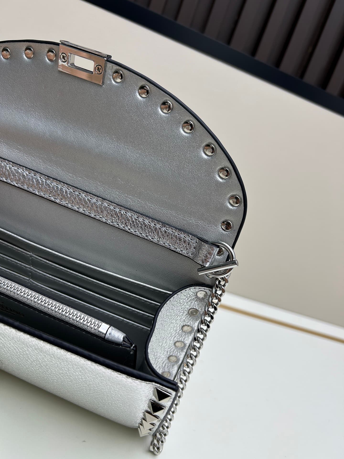 C8300 Garavani Rockstud Mini leather crossbody bag, featuring the iconic hook-clasp closure design — image 7