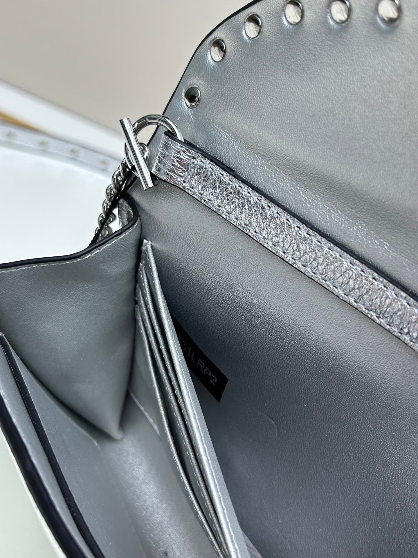 C8300 Garavani Rockstud Mini leather crossbody bag, featuring the iconic hook-clasp closure design — image 8