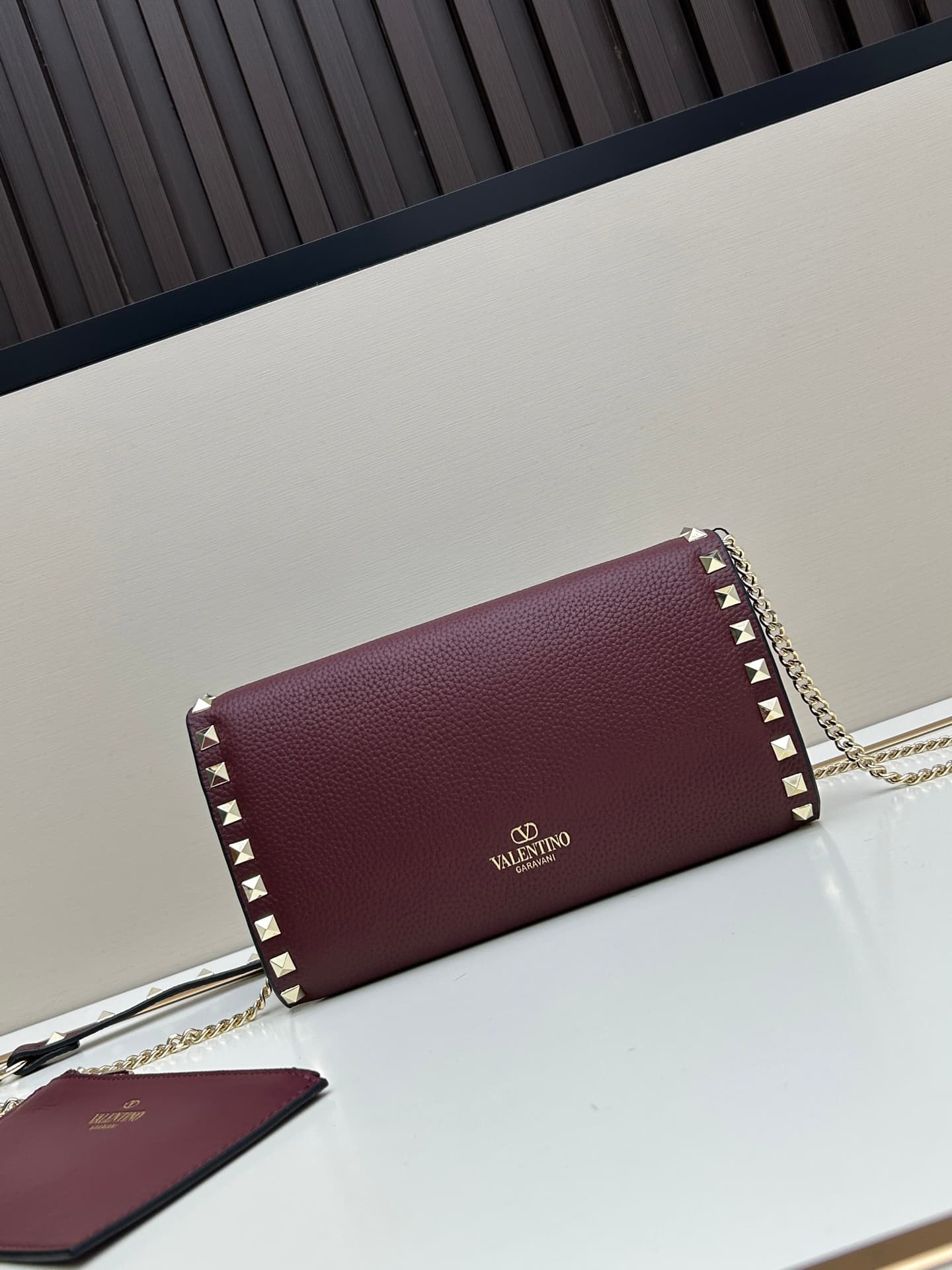 C8297 Garavani Rockstud Mini leather crossbody bag, featuring the iconic hook closure design — image 2