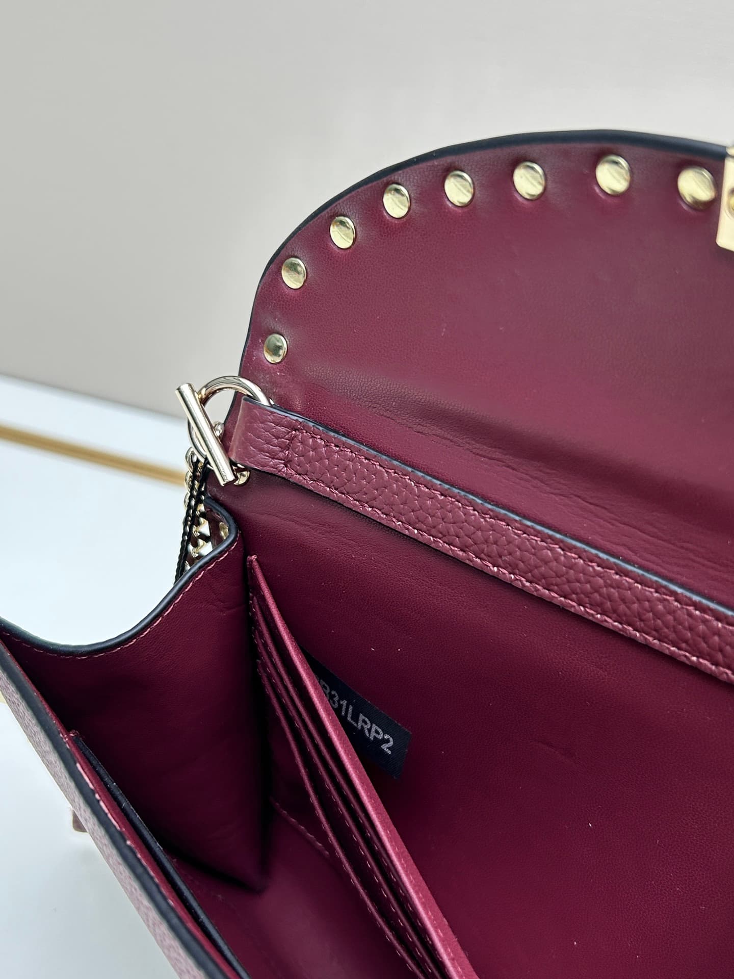 C8297 Garavani Rockstud Mini leather crossbody bag, featuring the iconic hook closure design — image 8