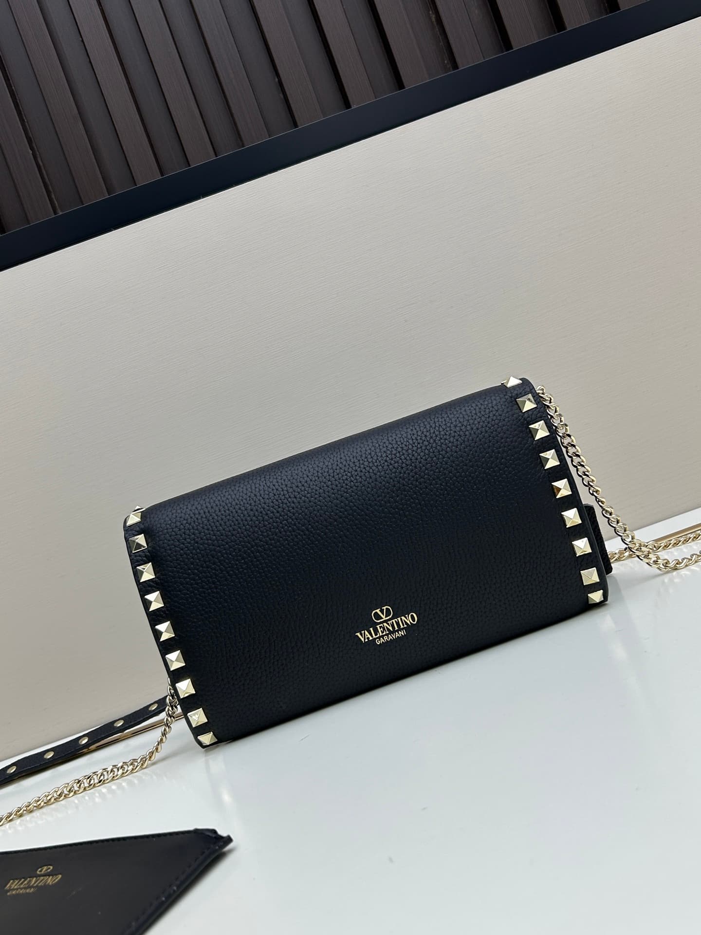 C8294 Garavani Rockstud Mini cowhide crossbody bag, featuring the iconic hook-clasp closure design — image 2