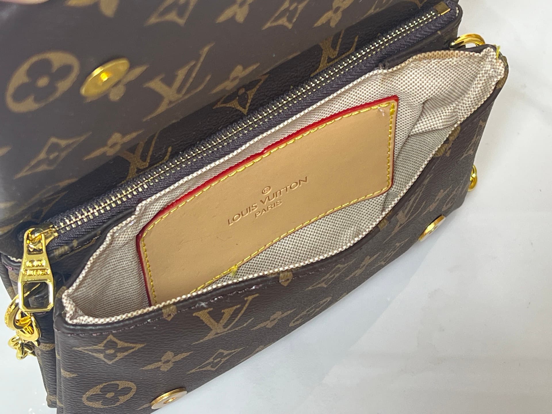 C5161 💰M81693 M80742 This Pochette Coussin handbag draws inspiration from the floral elements featured at the autumn/winter shows of Louis Vuitton 2022; it reveals the secret world of LV Garden. The bag is made of soft羊 leather with Monogram patterns, and — image 8