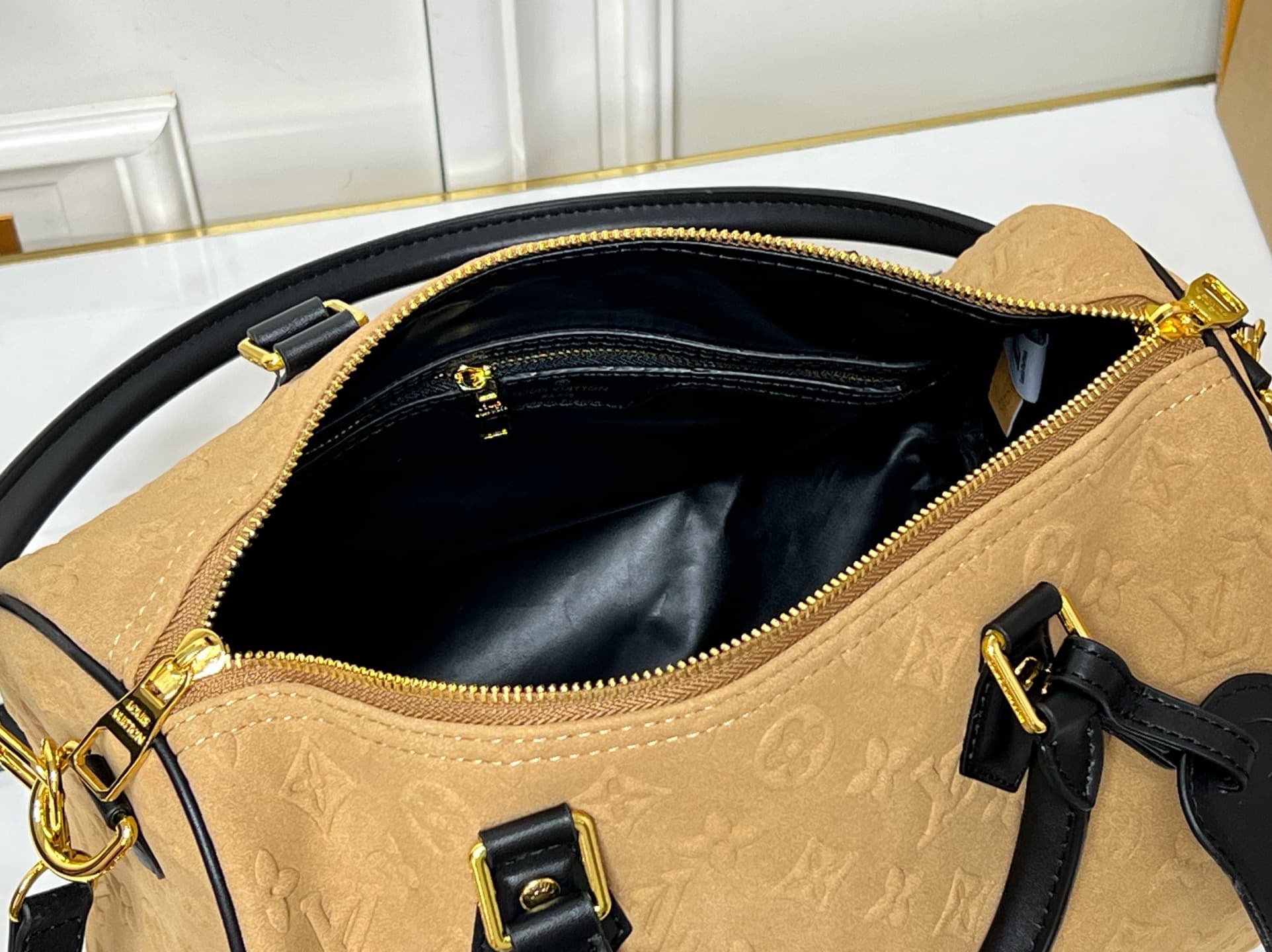 C5073 💰 M13332 M13344 apricot-colored embossed suede, fashion-oriented model. This Speedy Soft 30 is from LV Travels With Grace Coddlington line. — image 8