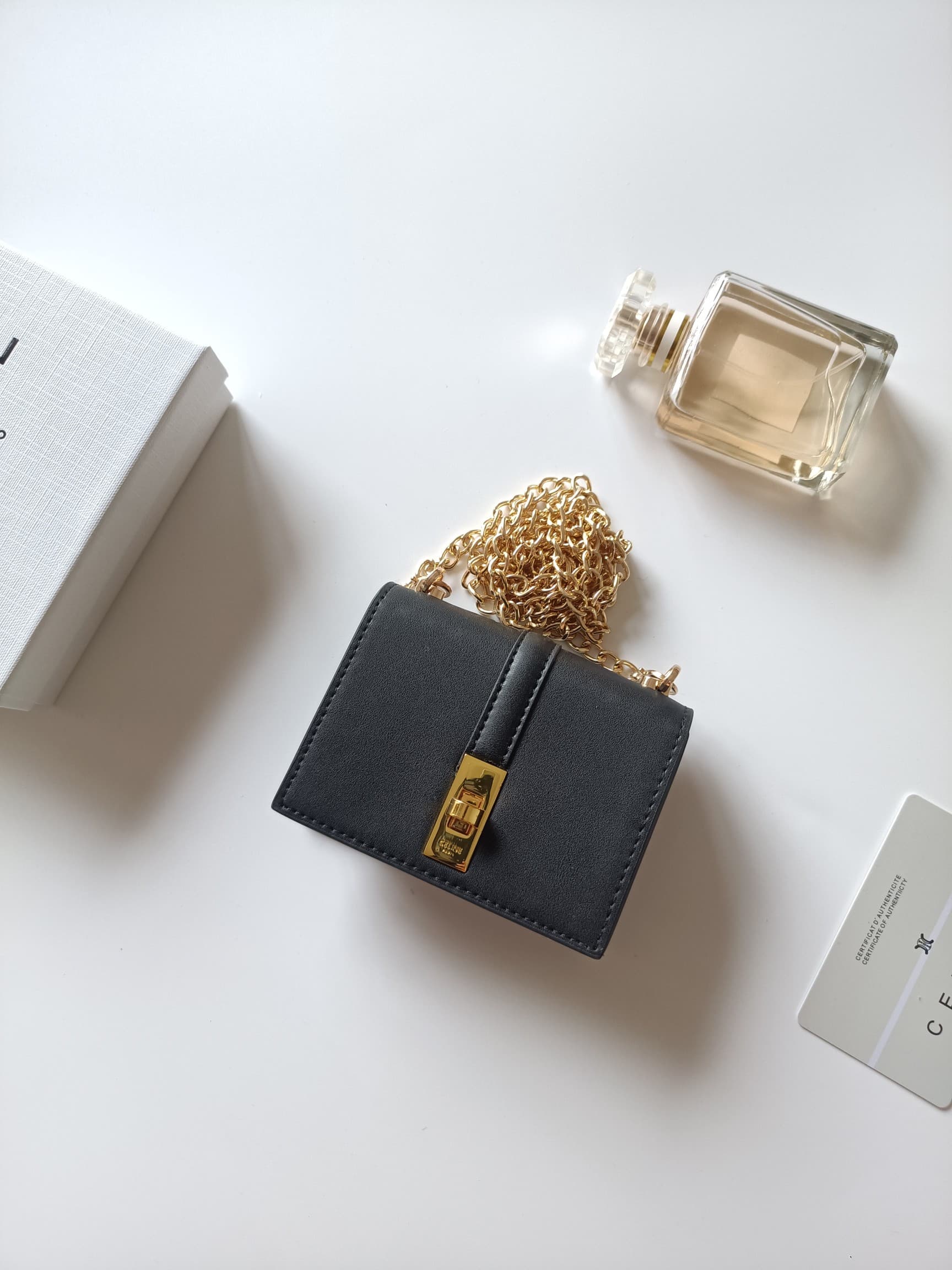 C445 Celine’s latest chain purse: TRIOMPHE flap chain purse, suitable for carrying diagonally. It features classic patterns on the inner layer, with smooth microfiber material. The closure is a rotating lock. There are 1 thick main compartment and 1 inner — image 2