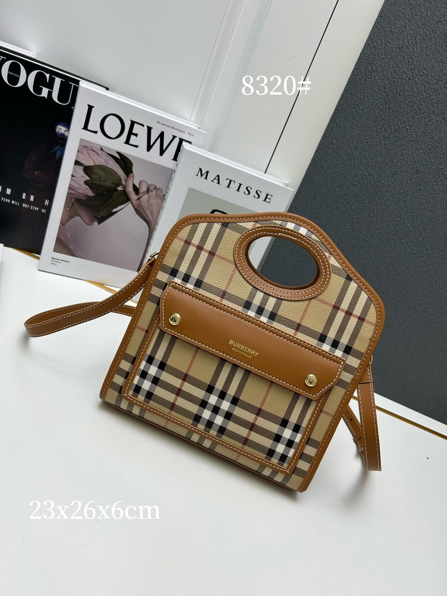 C42 [B Brand] Inspiration-Inspired Tote Bag. Made of leather with selected two-color grid patterns and visible stitching details. It features pockets on the front, and can be carried using a top handle or with detachable shoulder straps. Model number: 832 — image 1