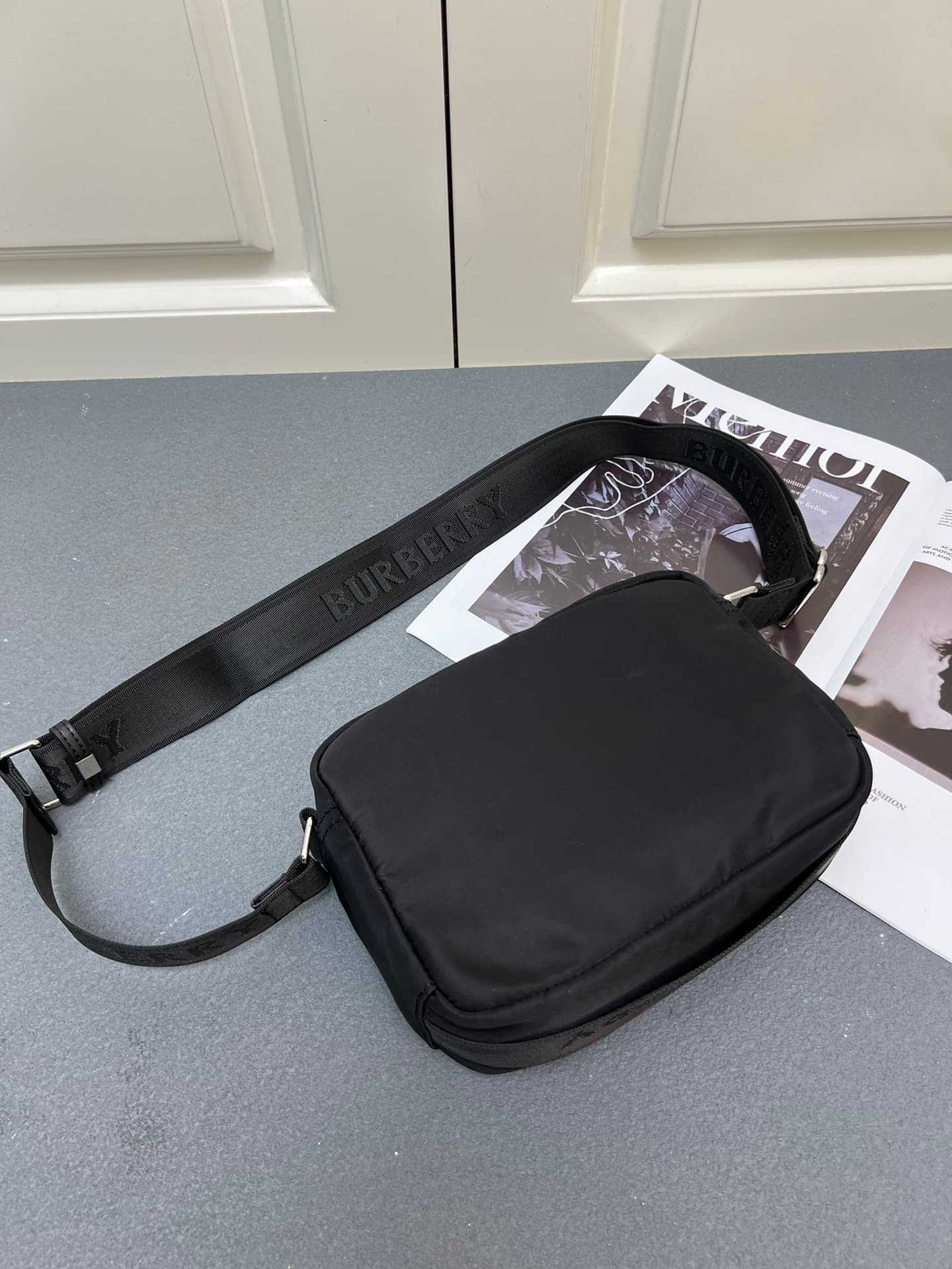 C37 [Brand B] 200: A vibrant decorative bag with a checked pattern in the “Paddy” style, featuring a brand logo embroidered on the strap. Adjustable diagonal shoulder strap; a zipper pocket; a magnetic closure external pocket. The zipper closure is also a — image 3