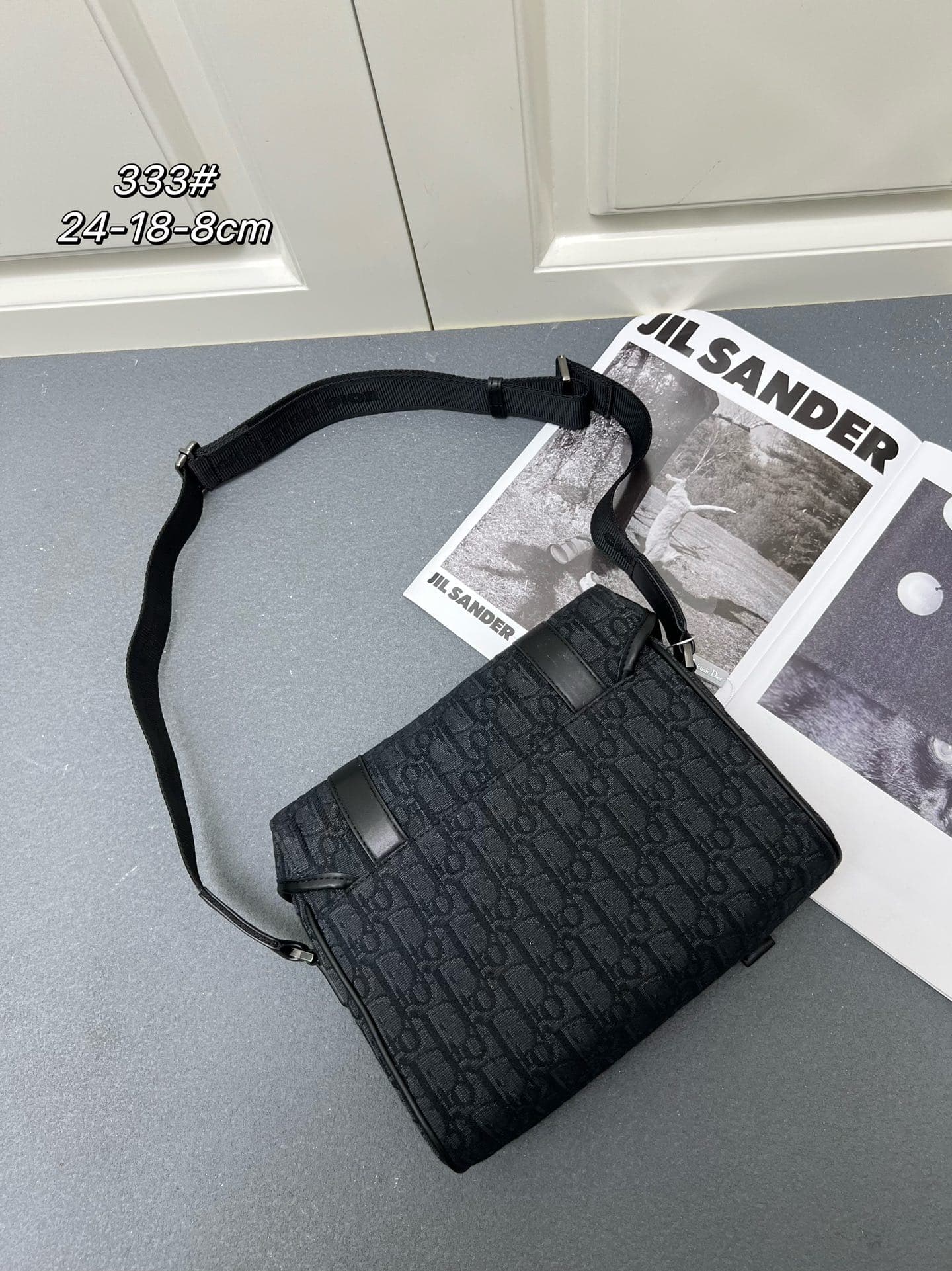 C1780 ¥ This messenger bag is a new product from the 2024 Autumn collection series. With its flap design, the modern and fashionable style perfectly highlights the high-end aesthetic, further enriching the Hit the Road series. The Gravity print effect on  — image 2