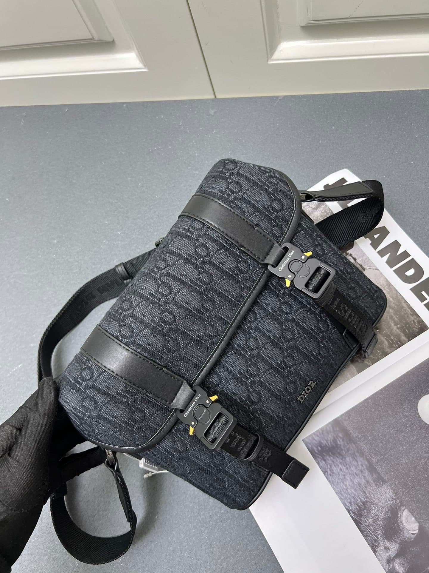 C1780 ¥ This messenger bag is a new product from the 2024 Autumn collection series. With its flap design, the modern and fashionable style perfectly highlights the high-end aesthetic, further enriching the Hit the Road series. The Gravity print effect on  — image 4