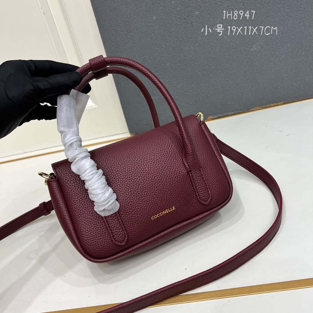 C8327 Small size, comes with a gift box. The new COCCINELLE Chicane bag features a crossbody design. Made of litchi-patterned cowhide material, it can be worn on the hand or shoulder. It’s casual and stylish, simple and elegant. — image 2