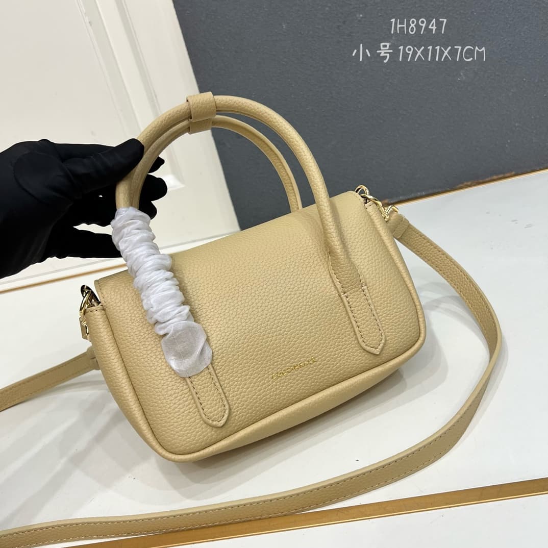 C8322 Small size, comes with a gift box. The new COCCINELLE Ciquenel crossbody bag is made of litchi-textured cowhide material. It can be worn on the hand or shoulder, offering a casual and stylish look, simple and elegant. — image 2