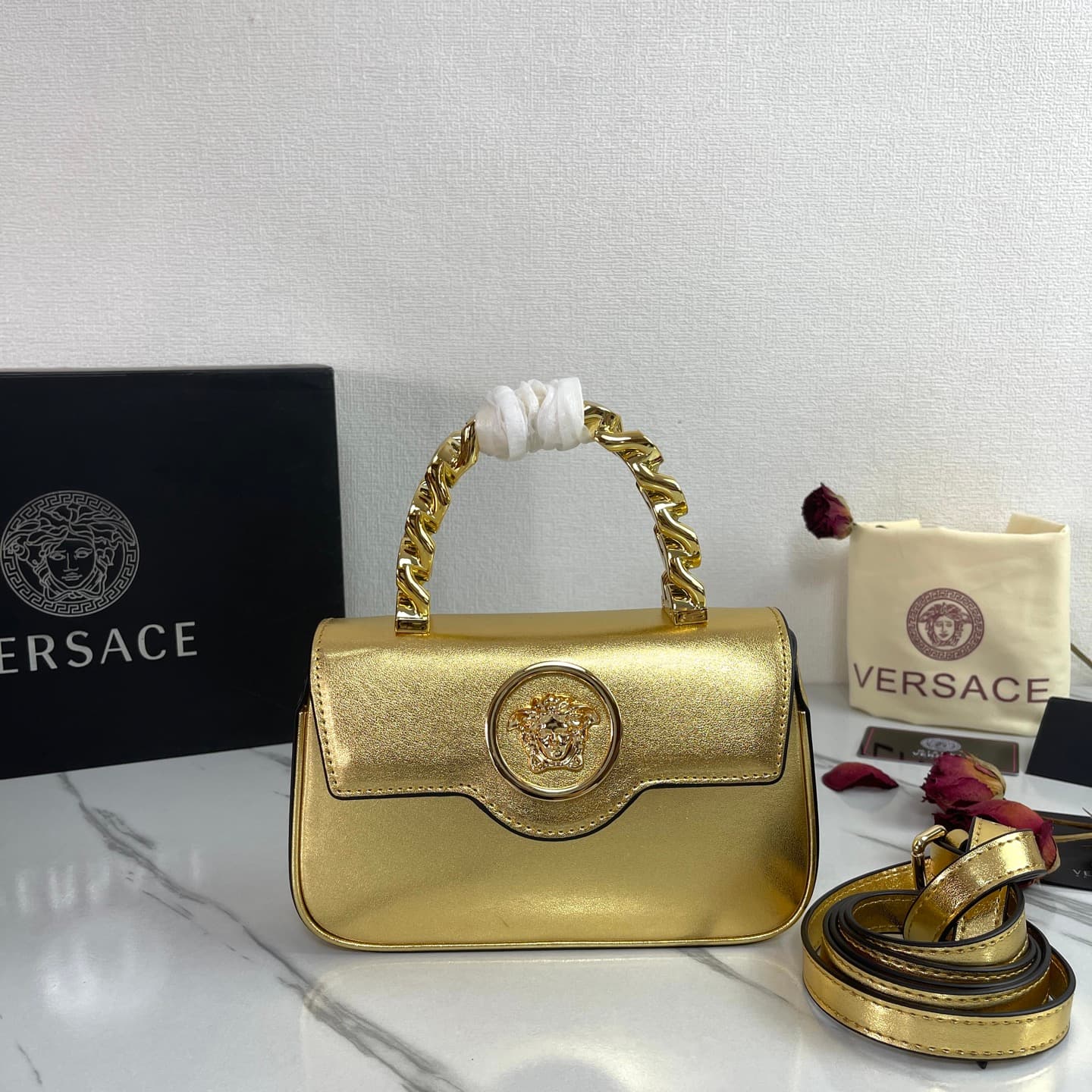 C2810 The new product is selling extremely well! The Versace handbag with shoulder strap features a Medusa head design, with the “ton-sur-ton” pattern in the center. The detachable and adjustable handle at the top of the strap offers additional options fo — image 1