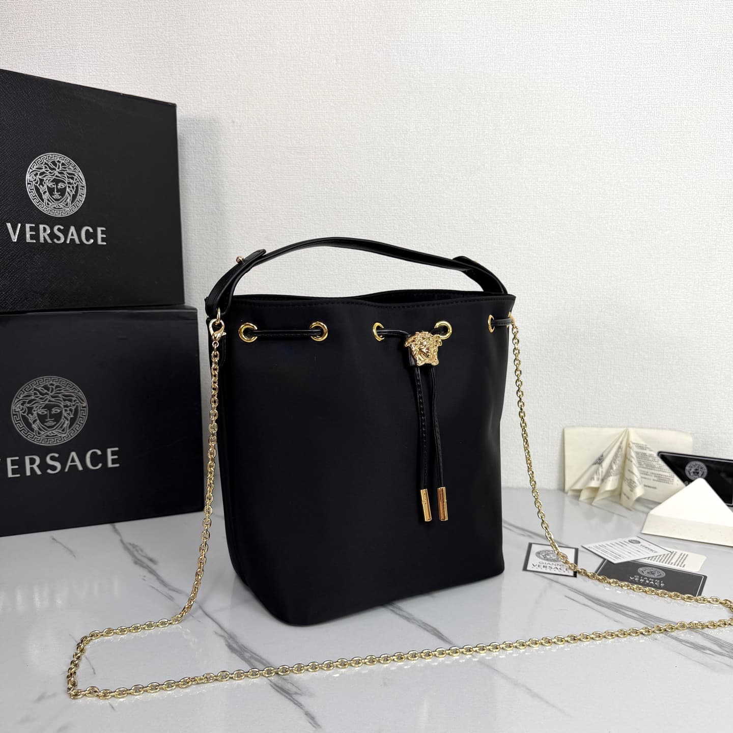 C8334 .2026 new model 🆕 available for sale. Versace mini women’s drawstring bucket bag, made of high-quality satin waterproof material. The large capacity is really impressive; it comes with long and short shoulder straps. — image 2