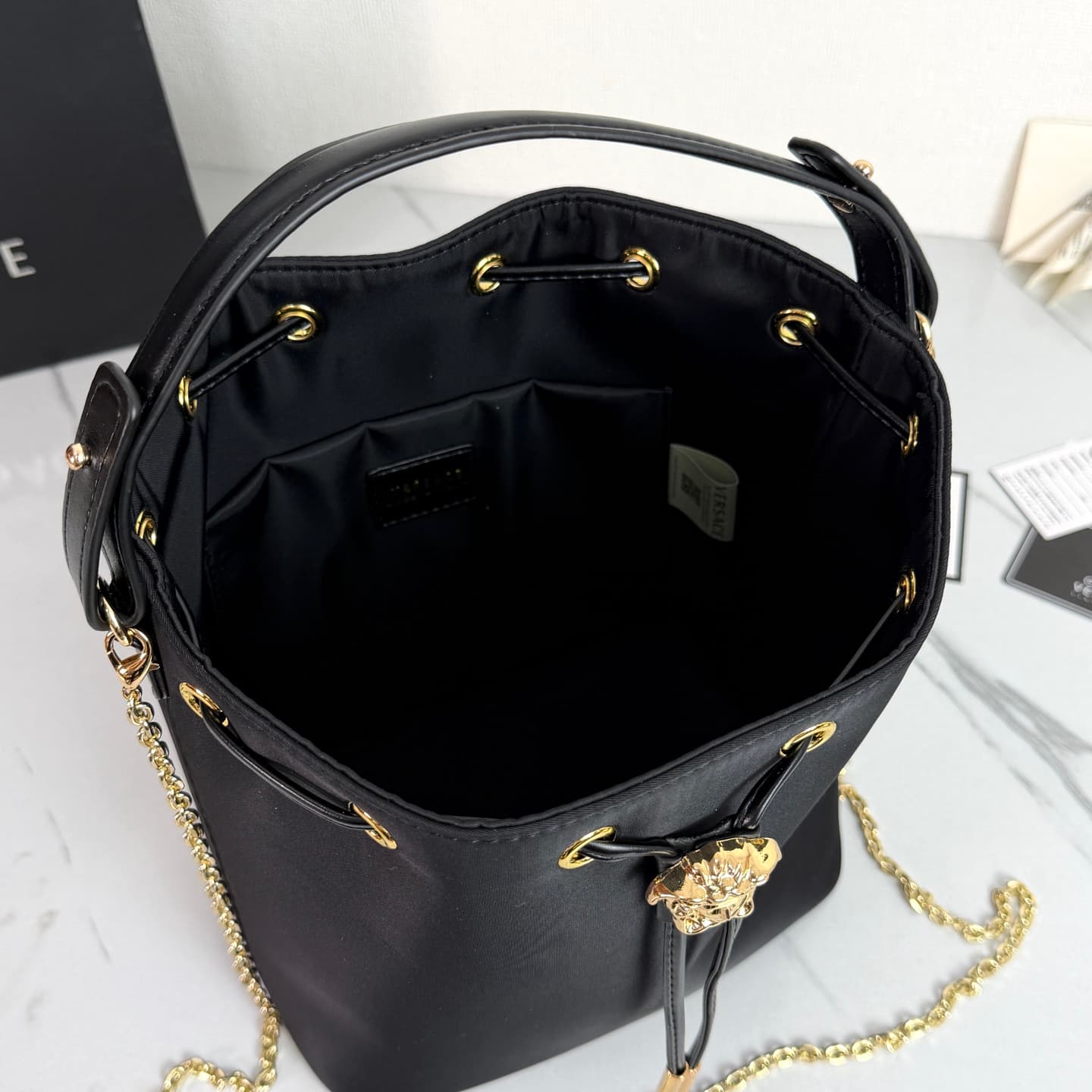 C8334 .2026 new model 🆕 available for sale. Versace mini women’s drawstring bucket bag, made of high-quality satin waterproof material. The large capacity is really impressive; it comes with long and short shoulder straps. — image 8
