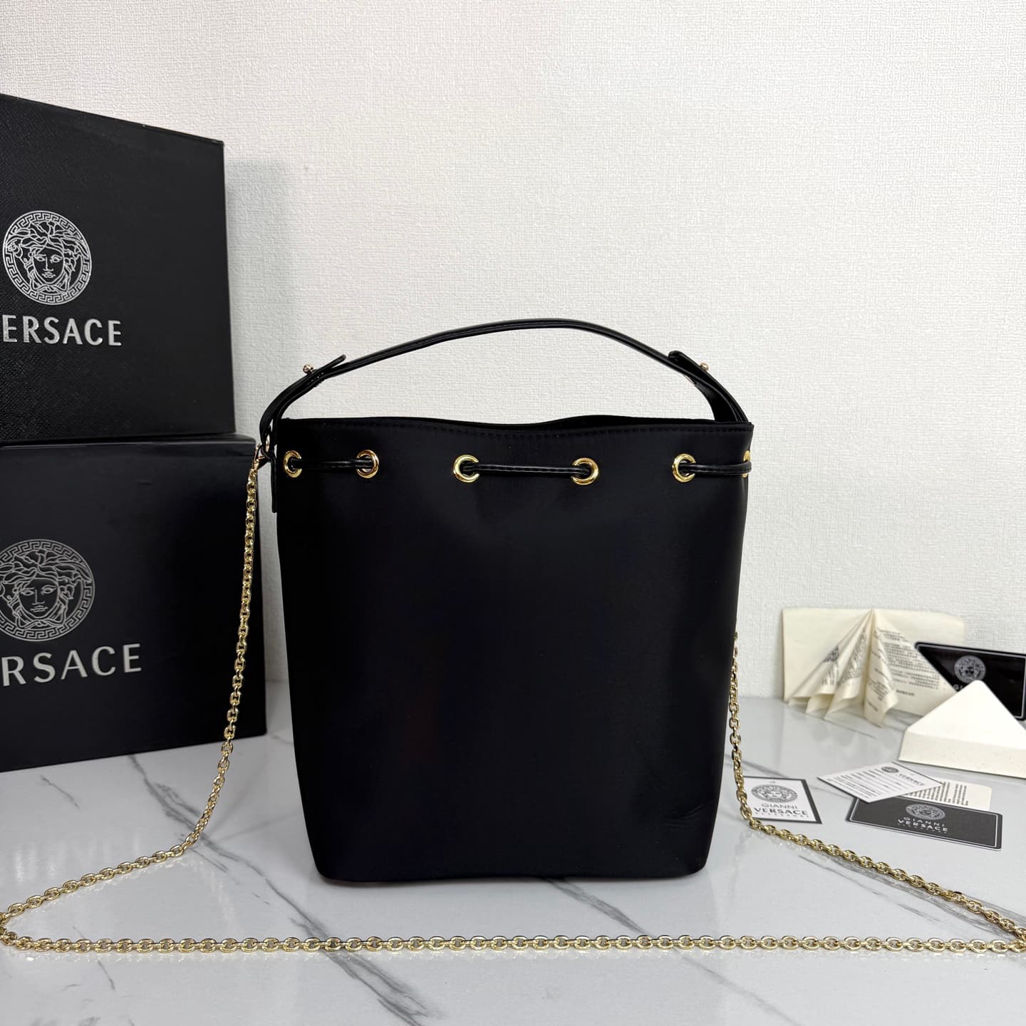 C8334 .2026 new model 🆕 available for sale. Versace mini women’s drawstring bucket bag, made of high-quality satin waterproof material. The large capacity is really impressive; it comes with long and short shoulder straps. — image 3