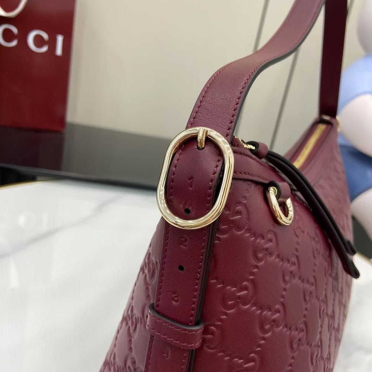 C4016 2025 Fall/Winter collection; GG Emblem series presents a fresh interpretation of the brand’s enduring elegance and exquisite craftsmanship. This shoulder bag is made from GG embossed leather, showcasing a delicate texture. — image 6