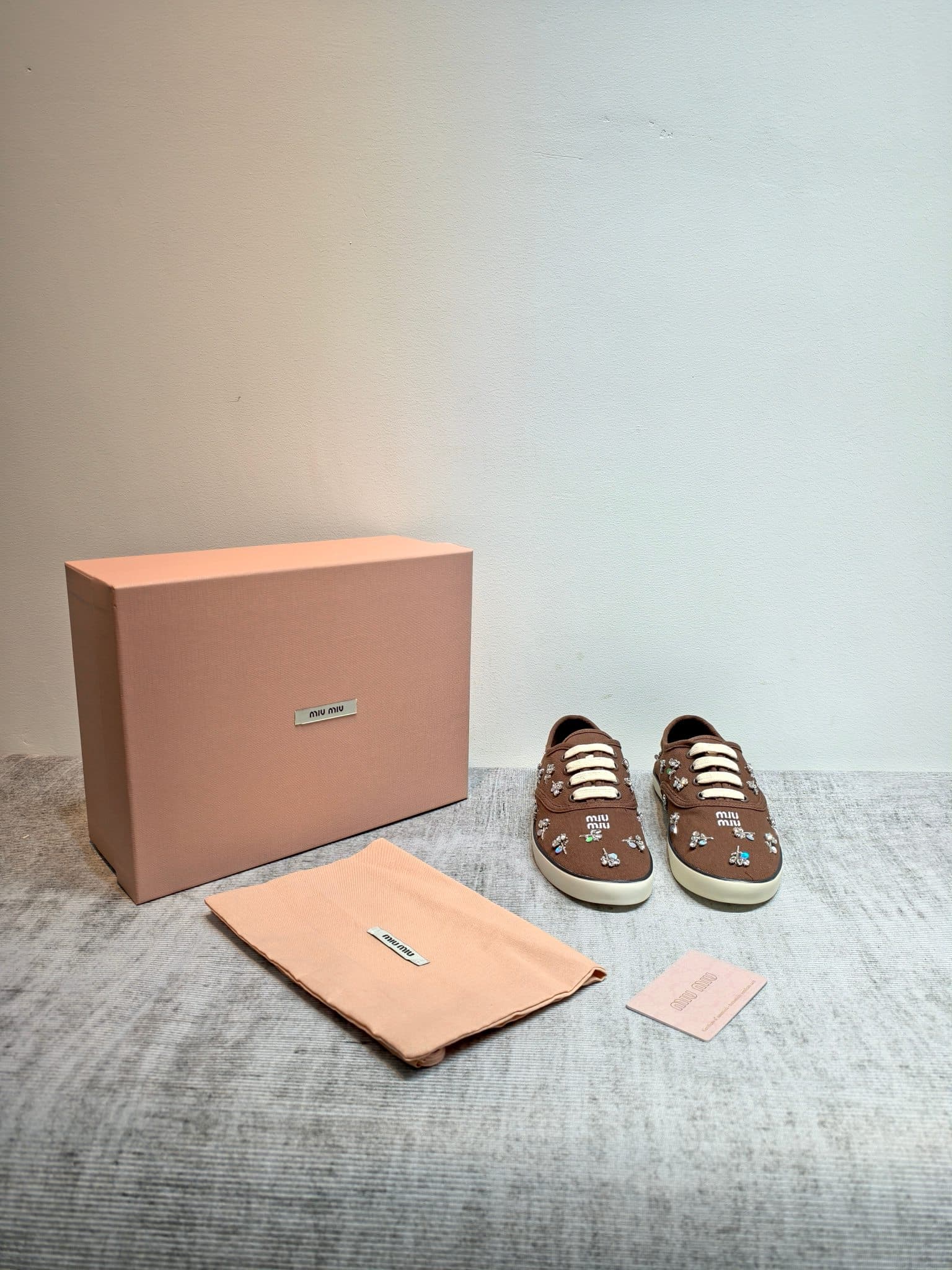 D10642 MIUMIU 2026 new model. The upper is made of twill canvas (textile material) with a textile lining. The sole is made of rubber with the brand logo. The insole is a detachable fabric insole, offering both comfort and a distinct brand feel. Iconic “pe — image 8
