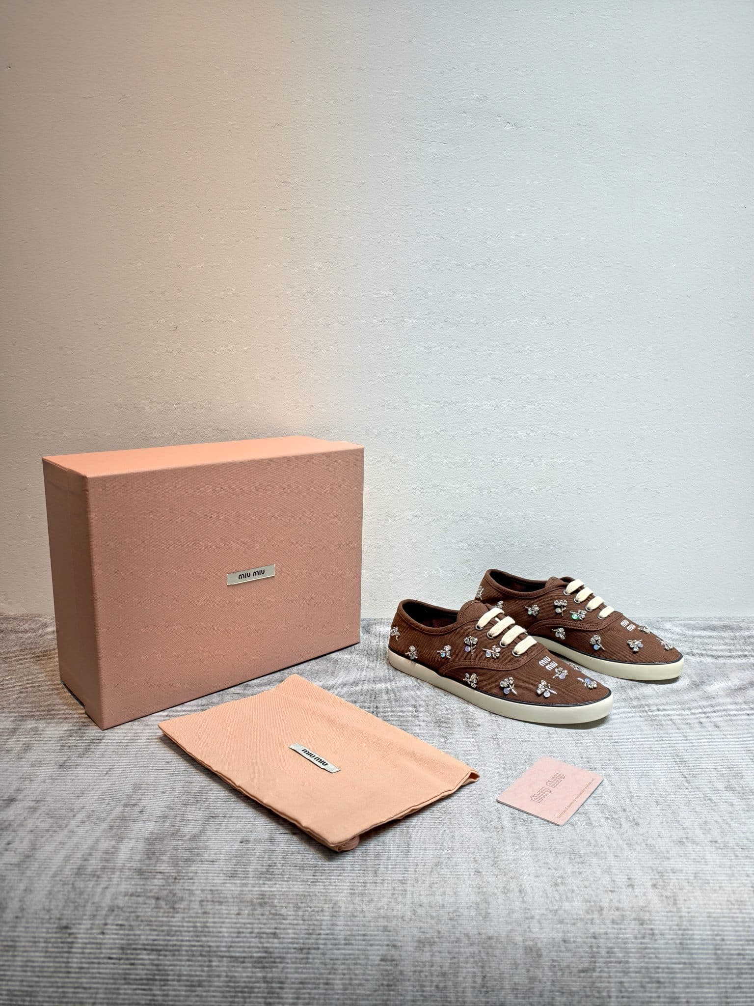 D10642 MIUMIU 2026 new model. The upper is made of twill canvas (textile material) with a textile lining. The sole is made of rubber with the brand logo. The insole is a detachable fabric insole, offering both comfort and a distinct brand feel. Iconic “pe — image 7