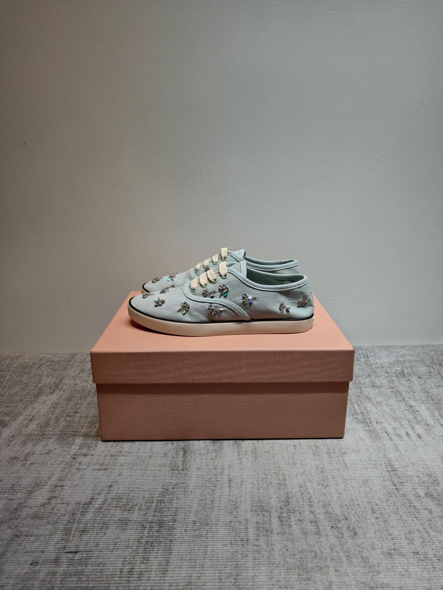 D10641 MIUMIU 2026 new model. The upper is made of twill canvas (textile material) with a textile lining. The sole is made of rubber with the brand logo. The insole is a detachable fabric insole, ensuring comfort and a distinct brand style. Signature “dia — image 8