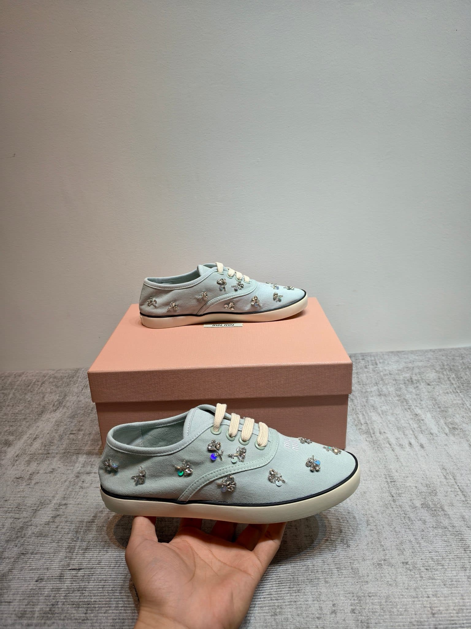 D10641 MIUMIU 2026 new model. The upper is made of twill canvas (textile material) with a textile lining. The sole is made of rubber with the brand logo. The insole is a detachable fabric insole, ensuring comfort and a distinct brand style. Signature “dia — image 6