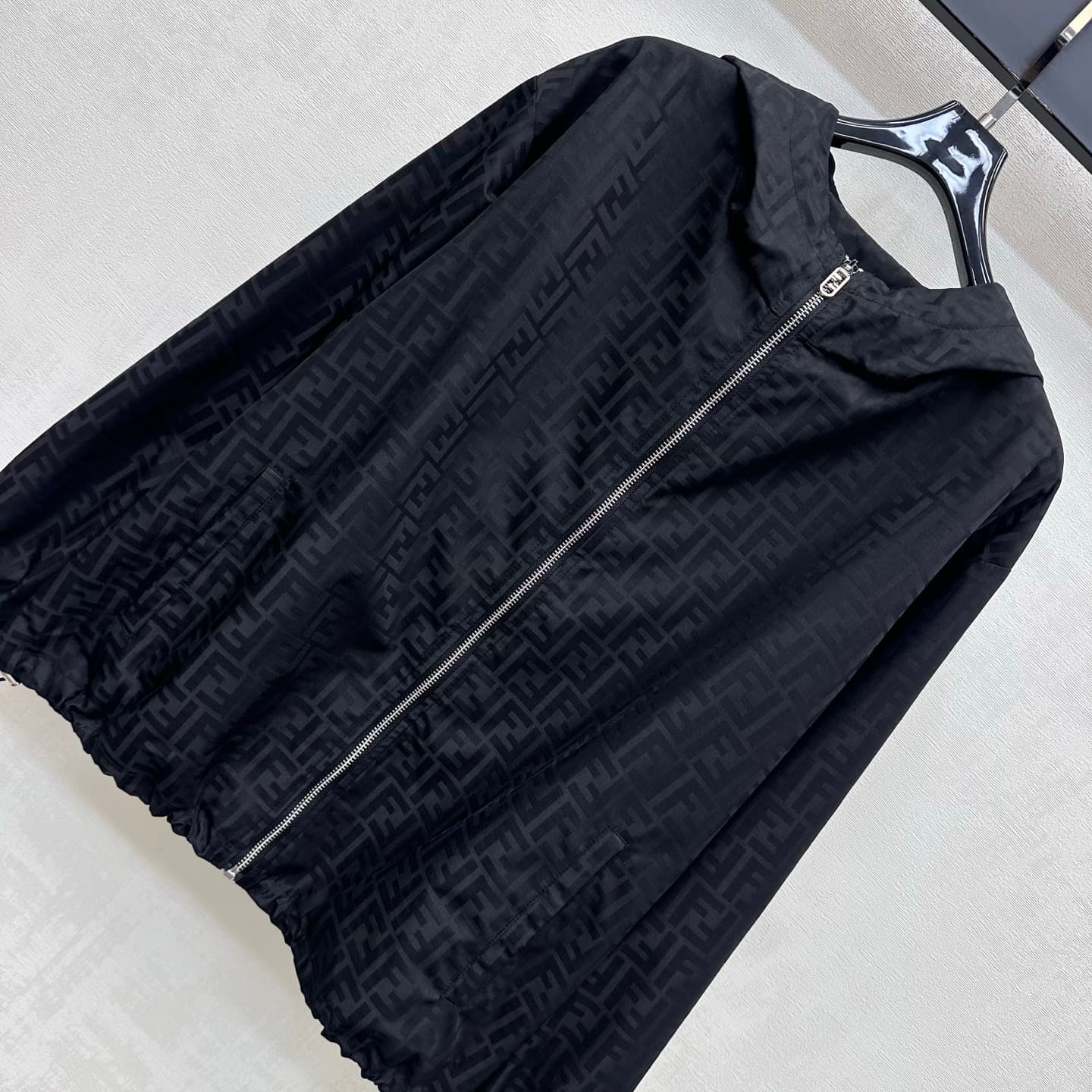 C19542 Fend*2026 new product launched. Full-print patterned hooded jacket. Customized YB imported nylon patterned fabric – smooth, wrinkle-resistant, lightweight and crisp. Features a metal zipper with hood opening design; along with drawstring at the hem — image 2
