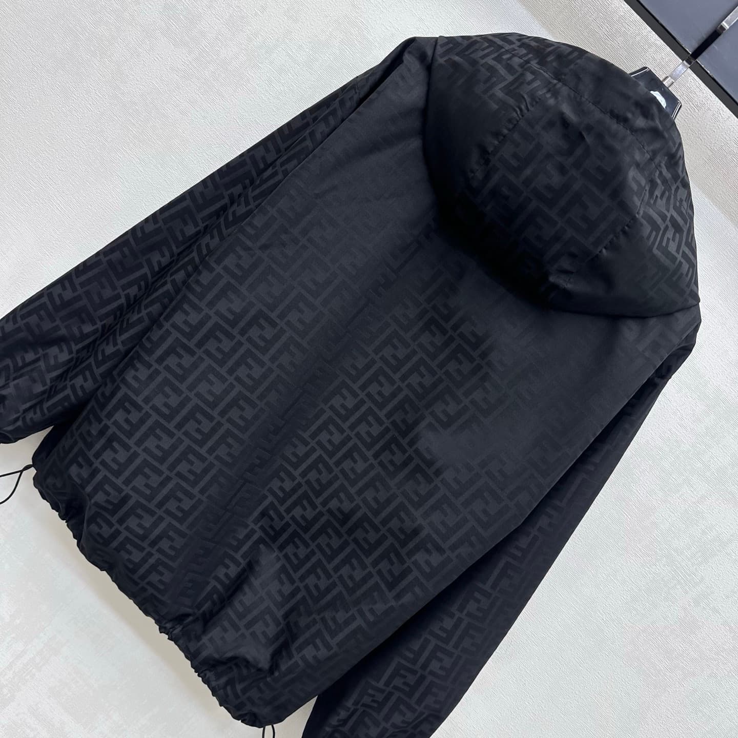 C19542 Fend*2026 new product launched. Full-print patterned hooded jacket. Customized YB imported nylon patterned fabric – smooth, wrinkle-resistant, lightweight and crisp. Features a metal zipper with hood opening design; along with drawstring at the hem — image 7