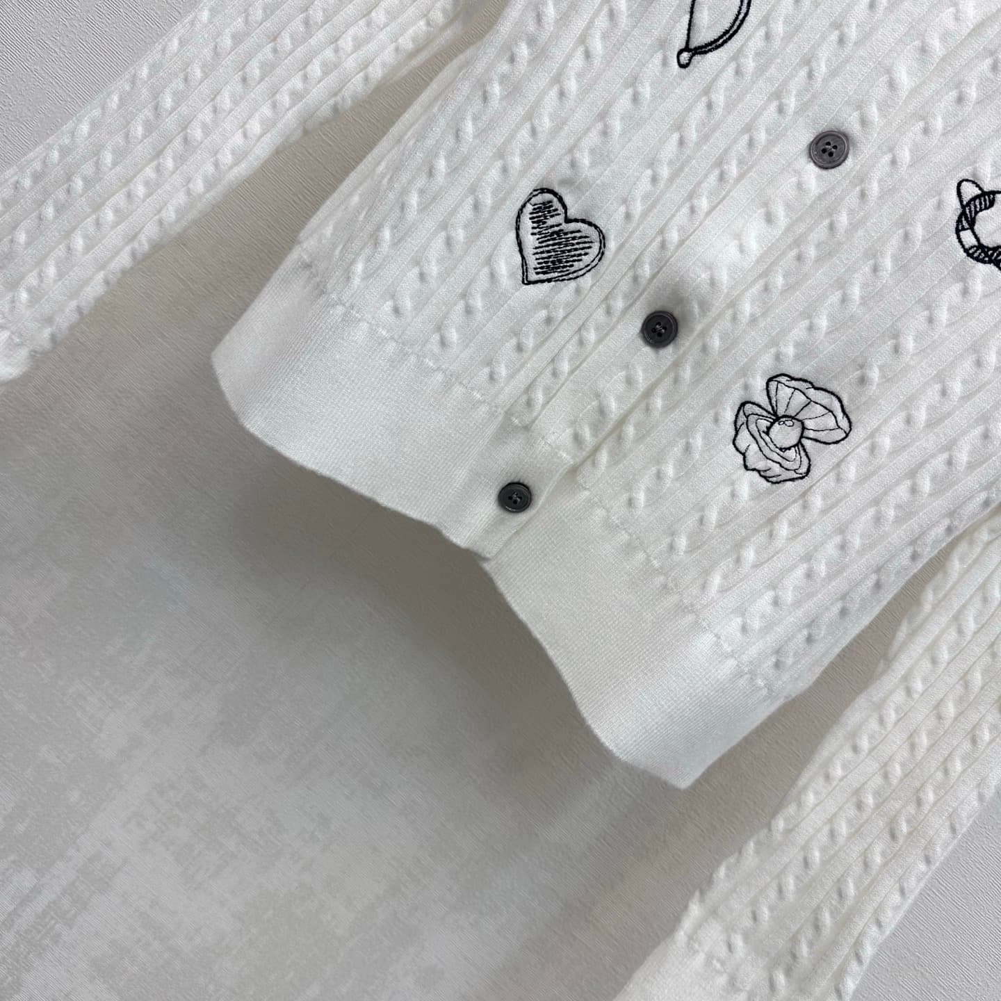 C19556 TB*2026 new product launched: embroidered knitted cardigan. Custom YB imported knitting material – soft and smooth, breathable and comfortable for the skin. Features a round neck with single-button closure; complemented by classic four-stripe ribbi — image 4