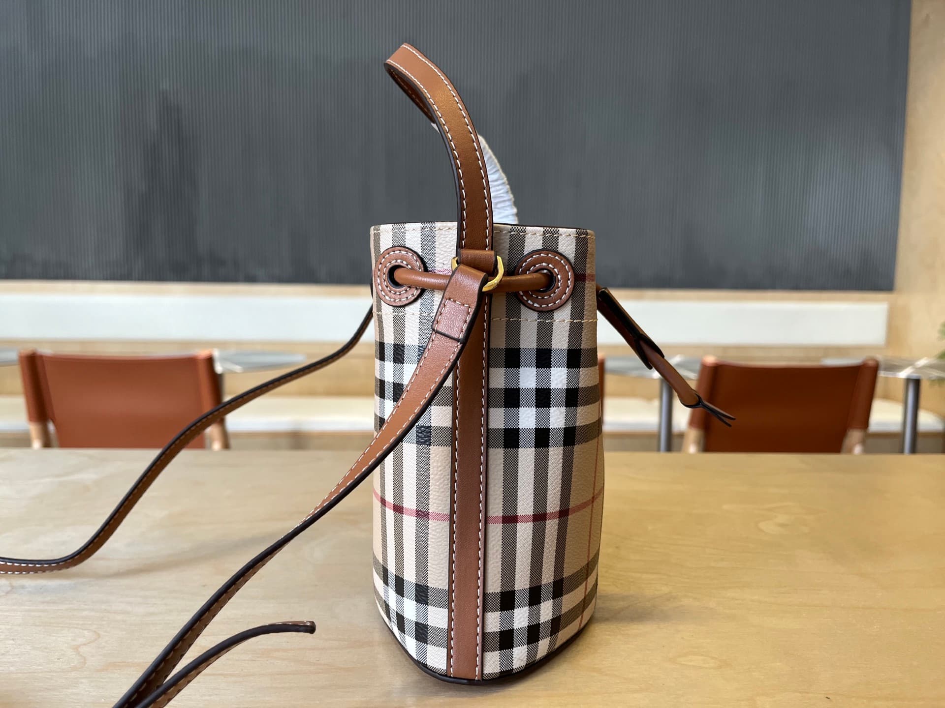 C15 B Brand Mini Bucket Bag with Pins, Vintage/retro Burberry pattern, Italian tanned leather trim and TB exclusive logo. 11, 16.5, 18.5cm detachable adjustable diagonal straps. Adjustable pin closure. Hand-painted lacquered edges. Glossy metal accessorie — image 4